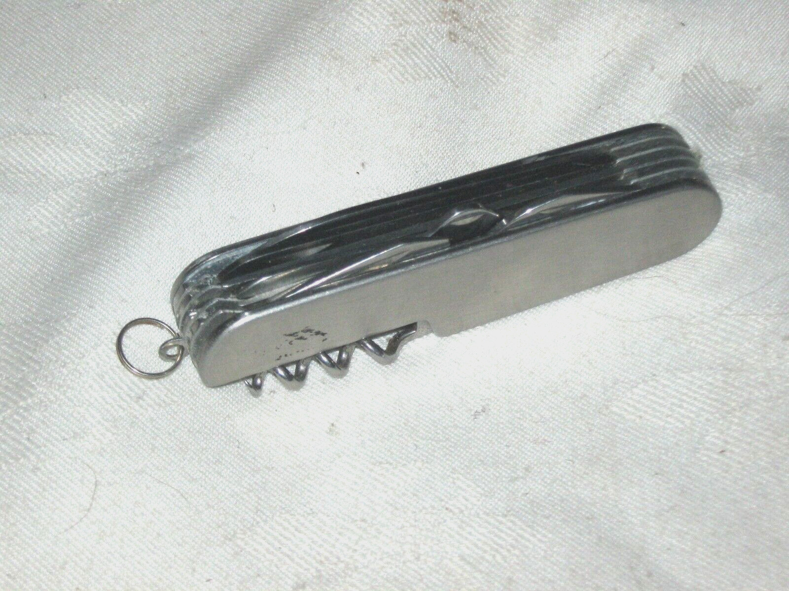 A Small 16-in-1 Stainless Steel Multi Function Tool Pocket Knife