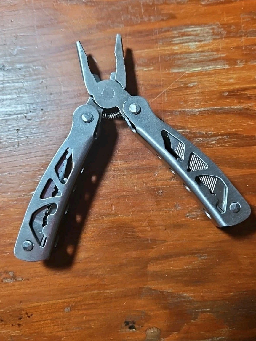 New! Stainless Steel Multi tool, Pliers, Wire Cutters, Screwdrivers, etc….
