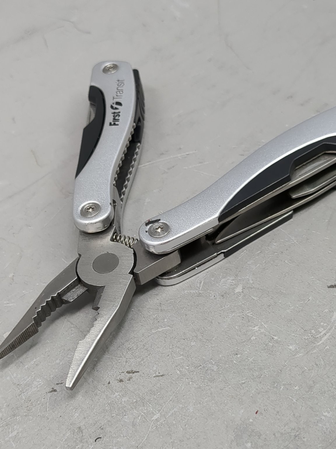 First Transit Multi-Tool Stainless Steel Pliers Knife Saw Screwdriver