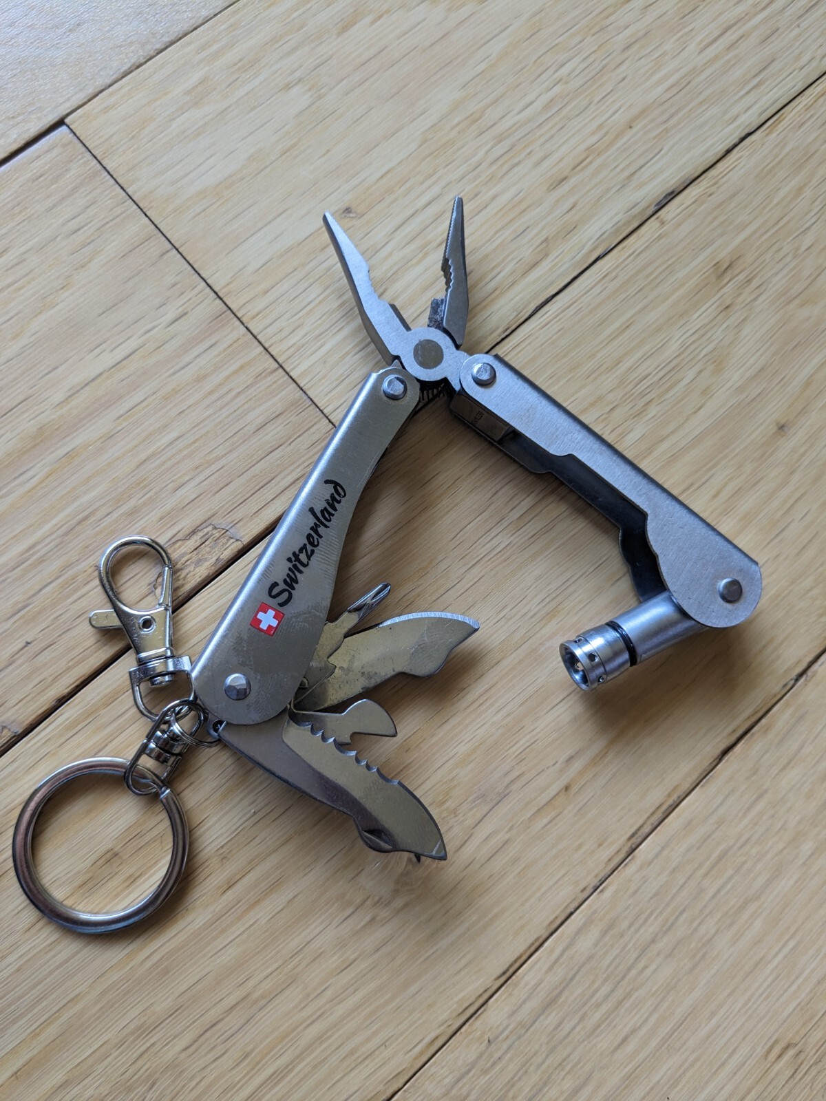 Swiss-Made Foldable Pocket Multi-Tool Stainless Steel w Pocket Clip. 8 Functions
