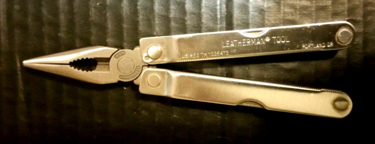 Leatherman Multi Twelve Tool Stainless 4″ No Sheath 2.5″ Blade Excellent + 1985