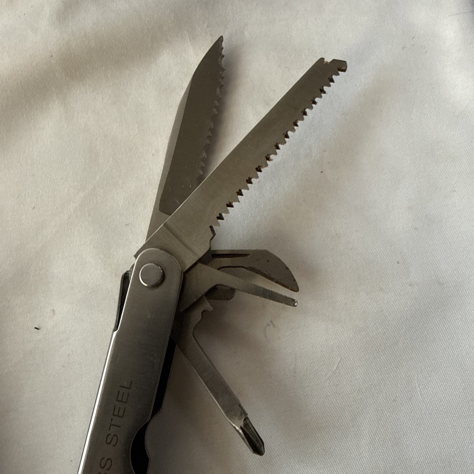 Tool Shop, multitool 13 tools plus!!! Nice tool!!! Not branded Stainless Steel