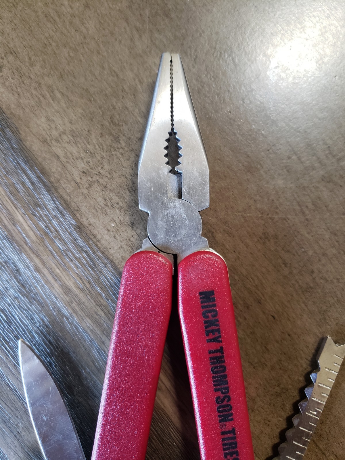 VINTAGE MICKEY THOMPSON TIRES BRANDED MULTI TOOL WITH CASE PLIERS KNIFE