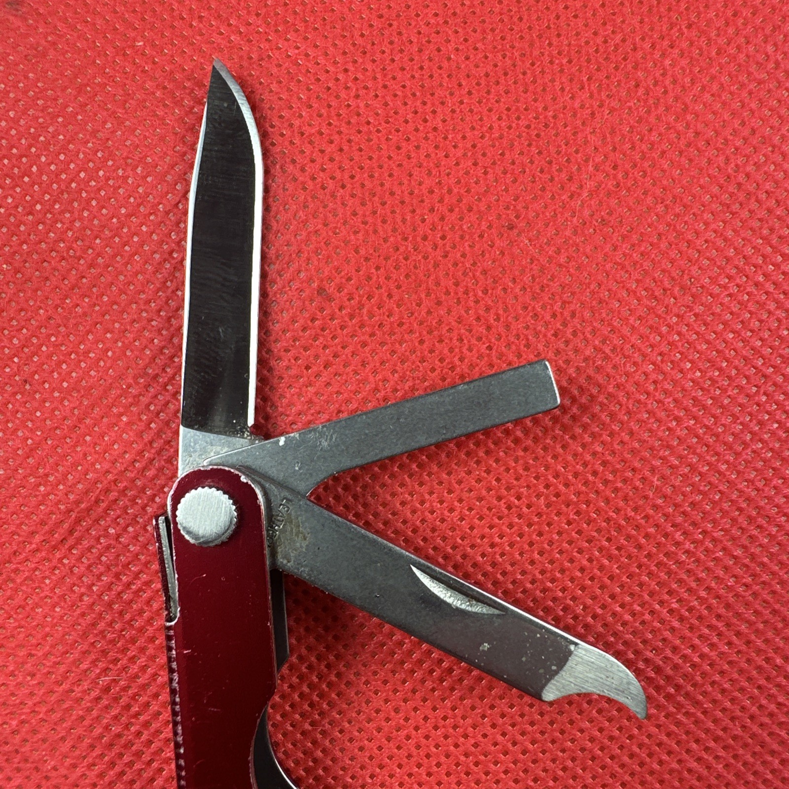 Red Blue Leatherman Micra Multi-Tool, scissor, knife, tweezer, screwdriver, EDC