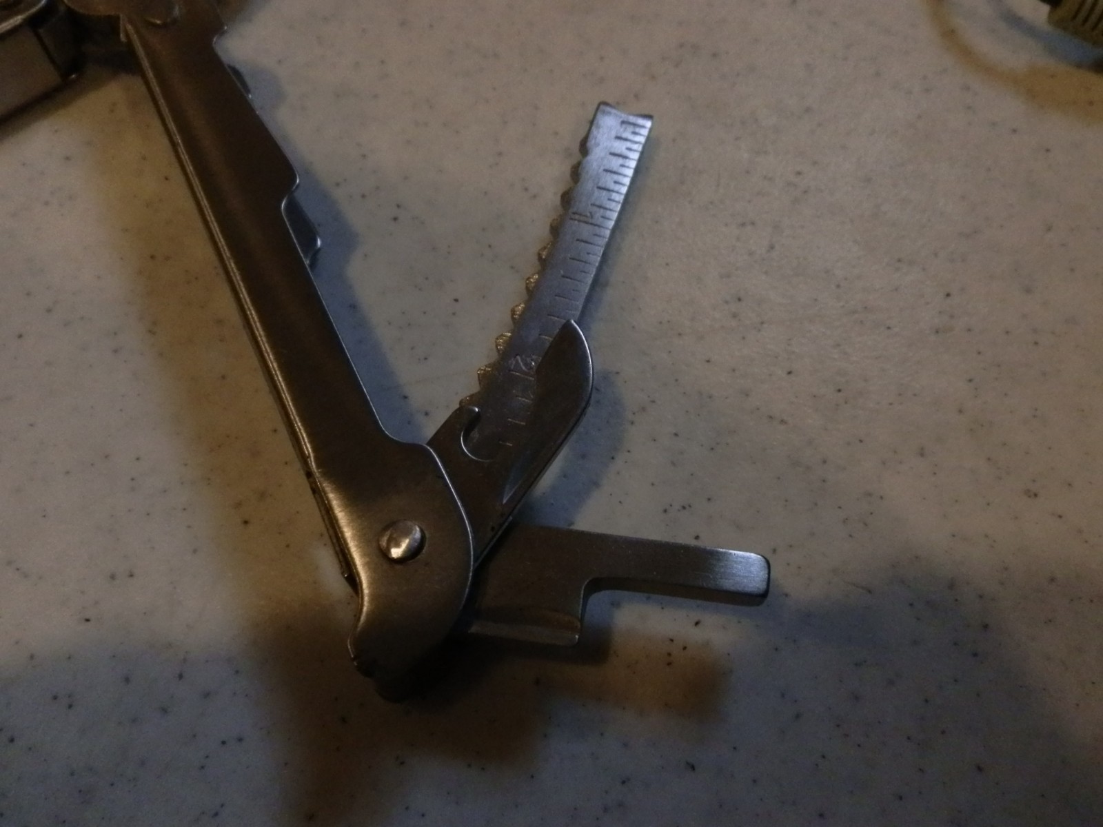 Multitool. Unbranded. Nylon sheath. 8 auxilliary bits – see photos. EUC