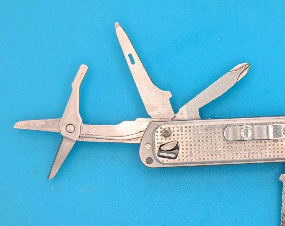 Leatherman FREE T4 Pocket Knife Multi-tool! Stainless! RETIRED!