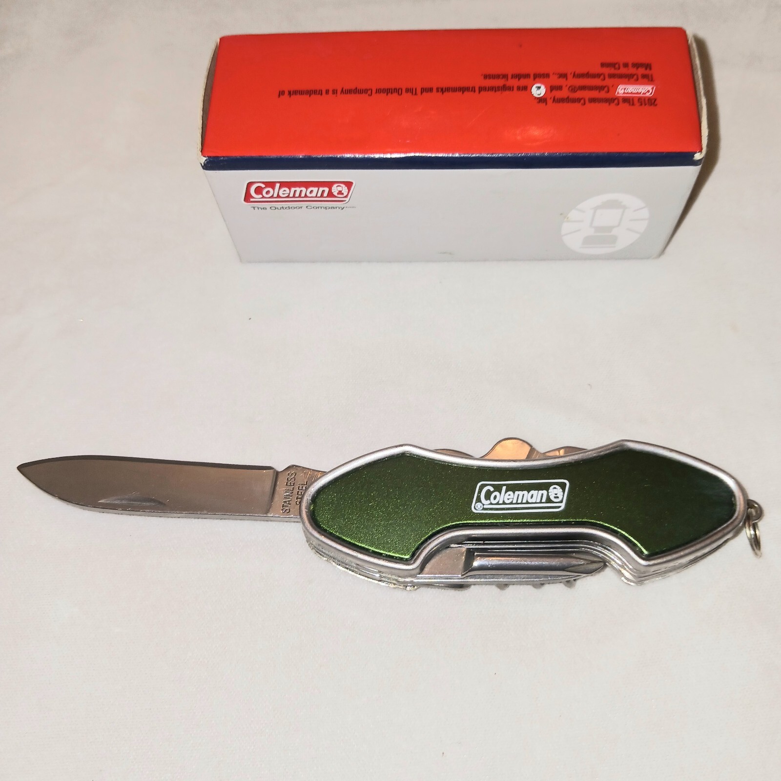 Amazing 3 and 1/2″ Coleman Multi Function Knife NOS, 7 Tools In It!!