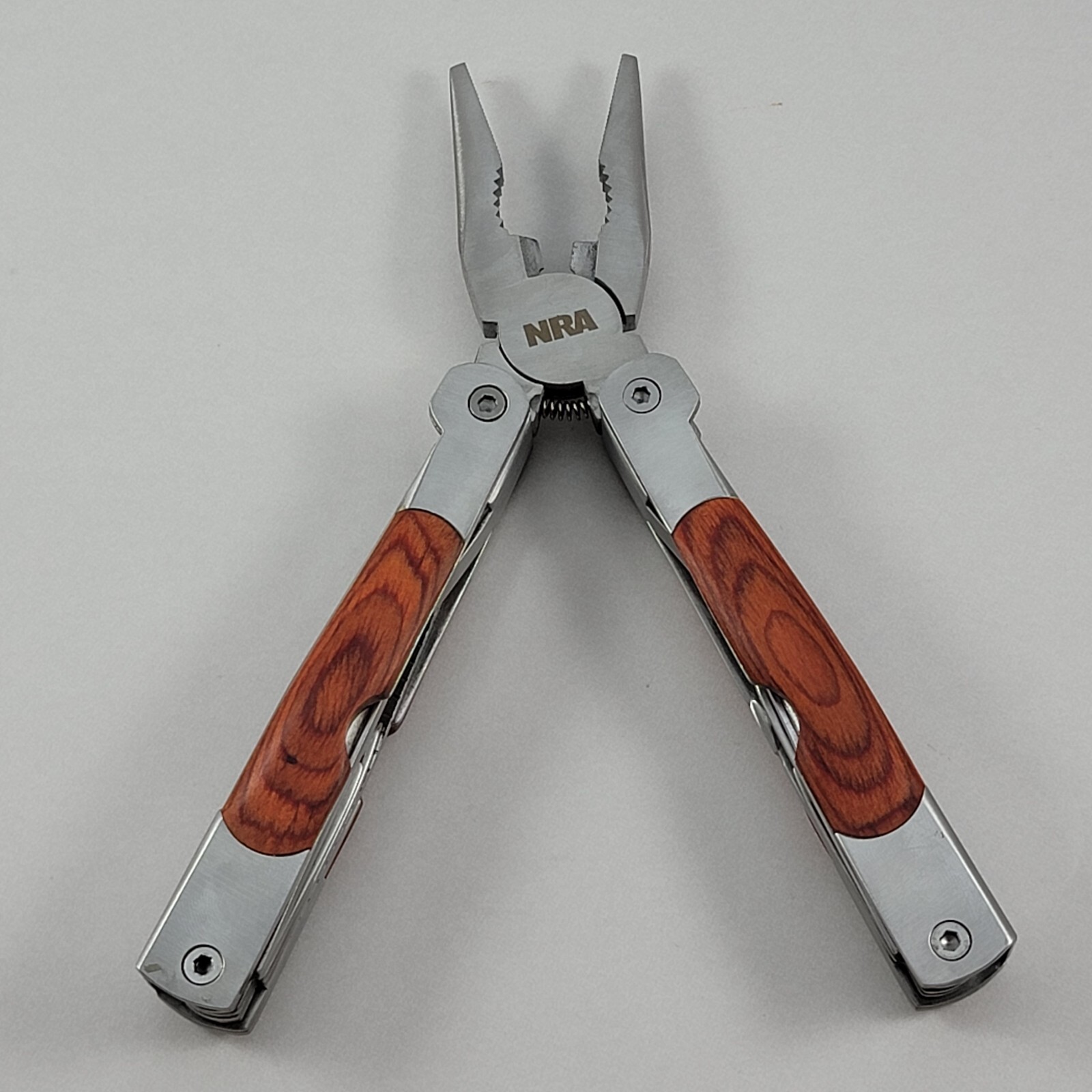 NRA Multi Tool – 4.5″ With Sheaf – Pliers, Knife, Can Opener & More – CLEAN