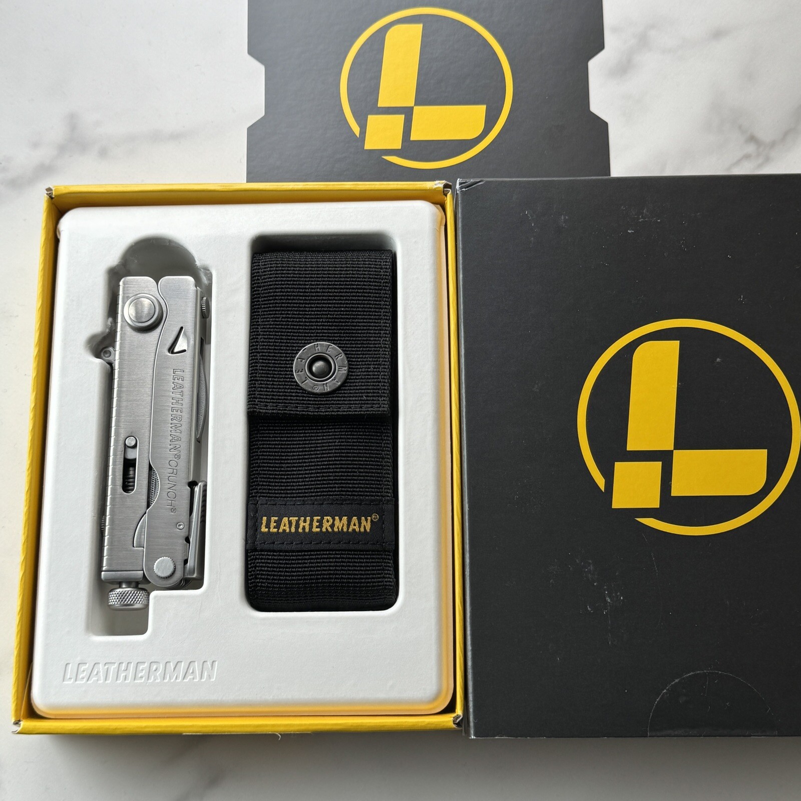 Leatherman Crunch multitool w/snap ballistic nylon sheath. Made in USA