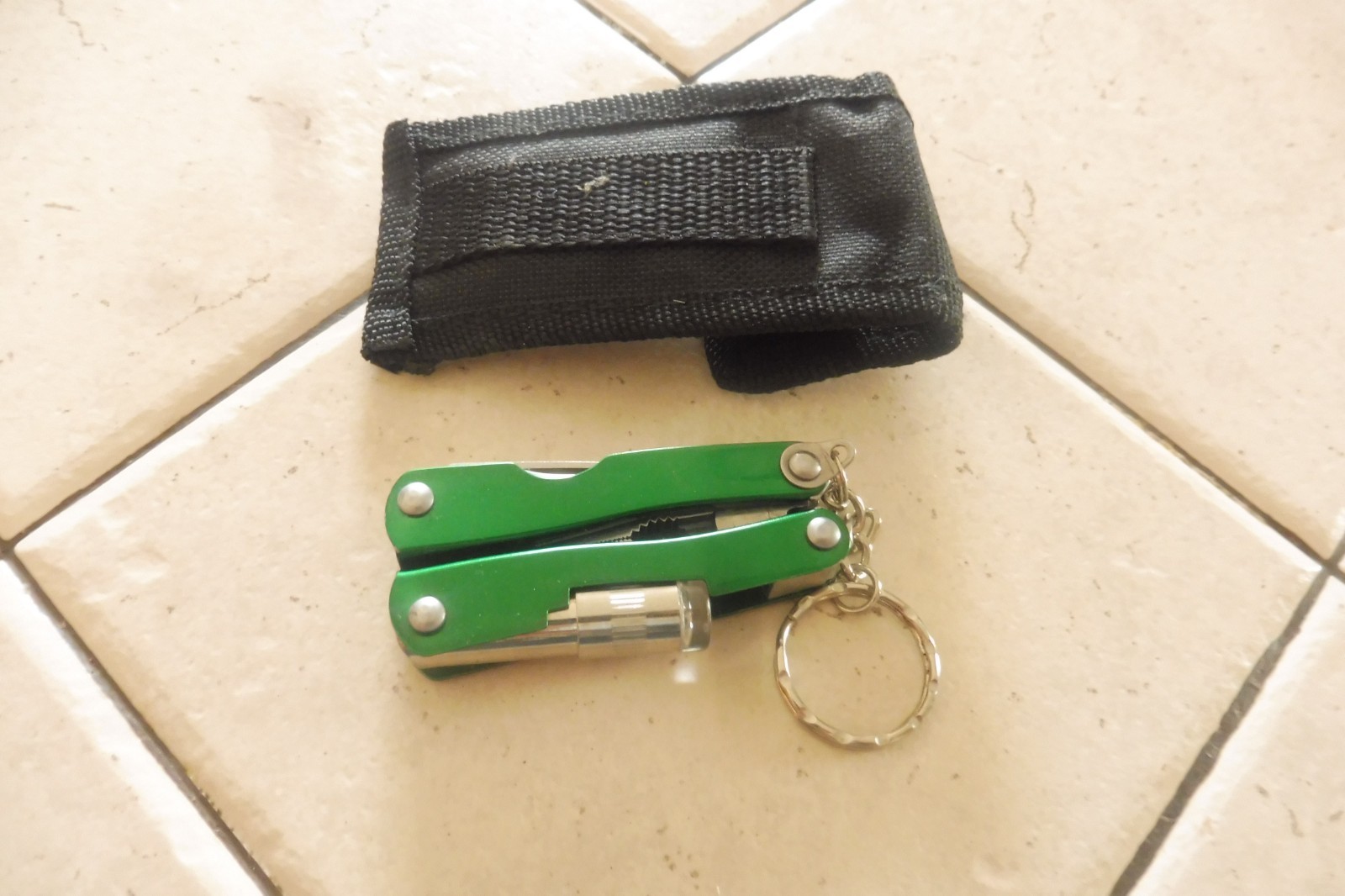 CABELA’S SMALL 7 FUNCTION MULTI-TOOL W/ LIGHT & NYLON SHEATH