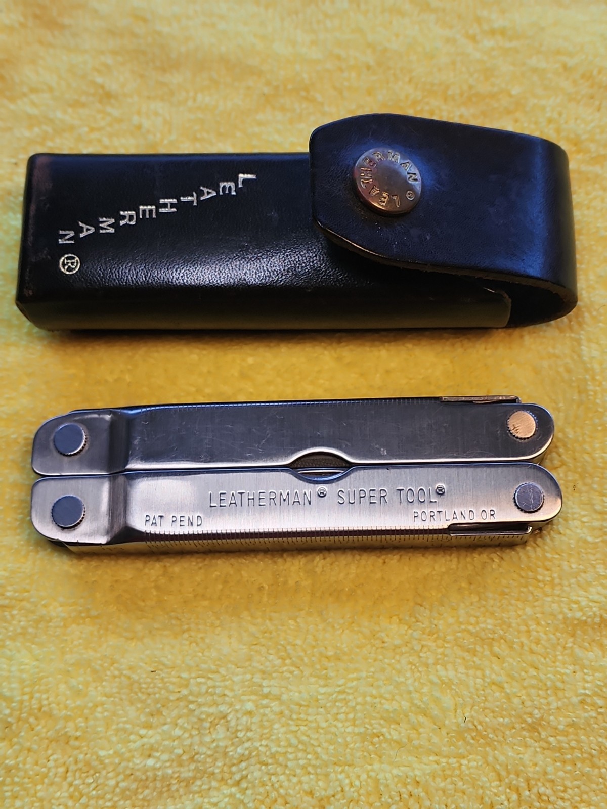 Vintage Leatherman Super Tool Pat Pending with Leather Sheath Super Nice