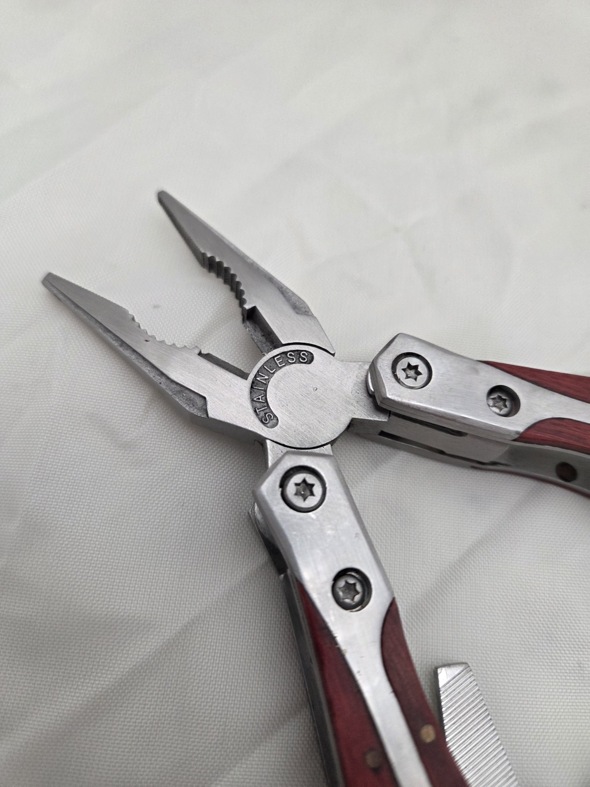 Stainless Steel Leatherman type multi tool with wood trim