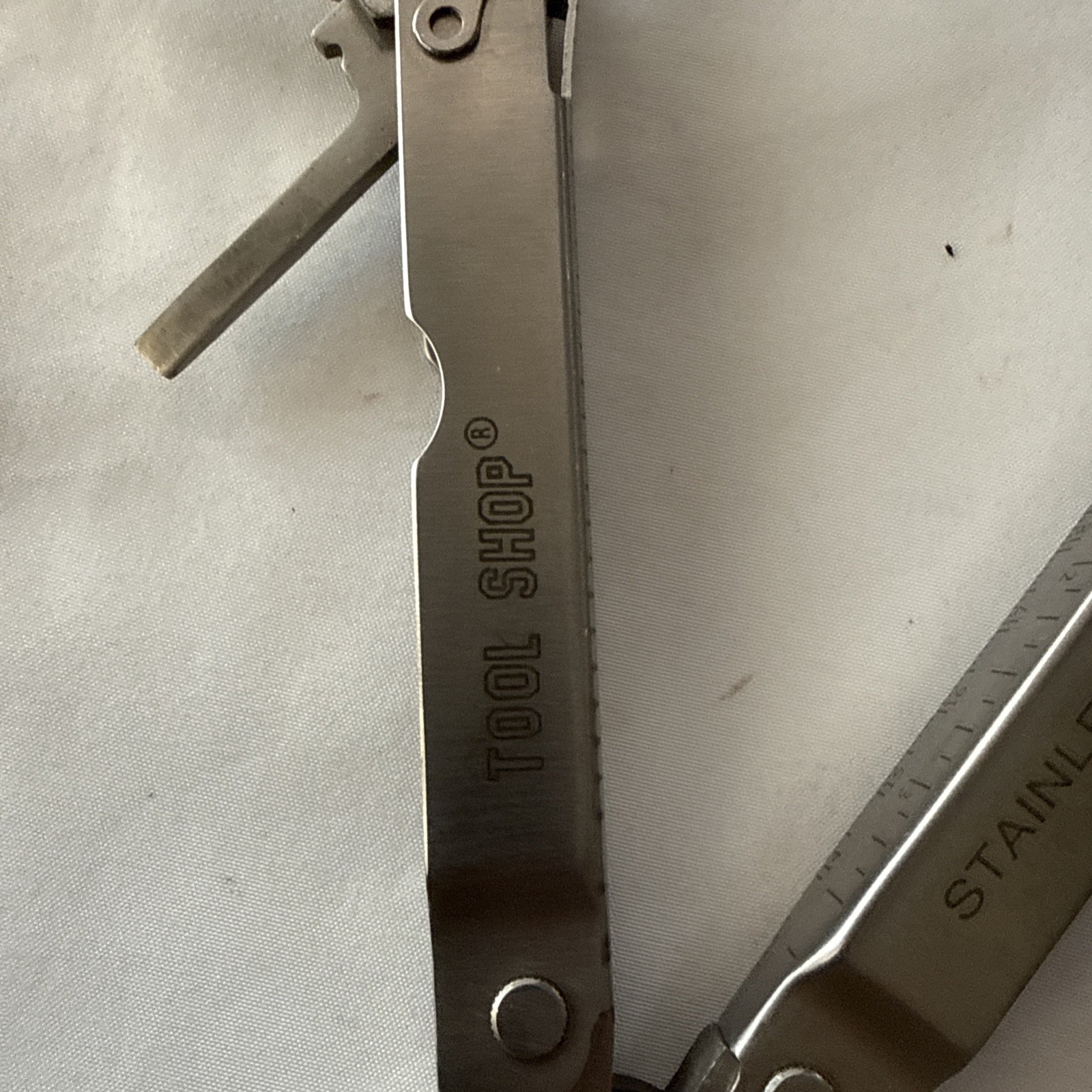 Tool Shop, multitool 13 tools plus!!! Nice tool!!! Not branded Stainless Steel