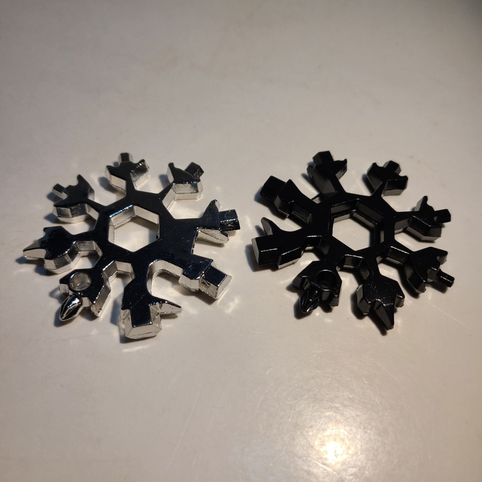 18-in-1 Stainless Steel Snowflake Multi-Repair Tool with Bottle Opener, etc.