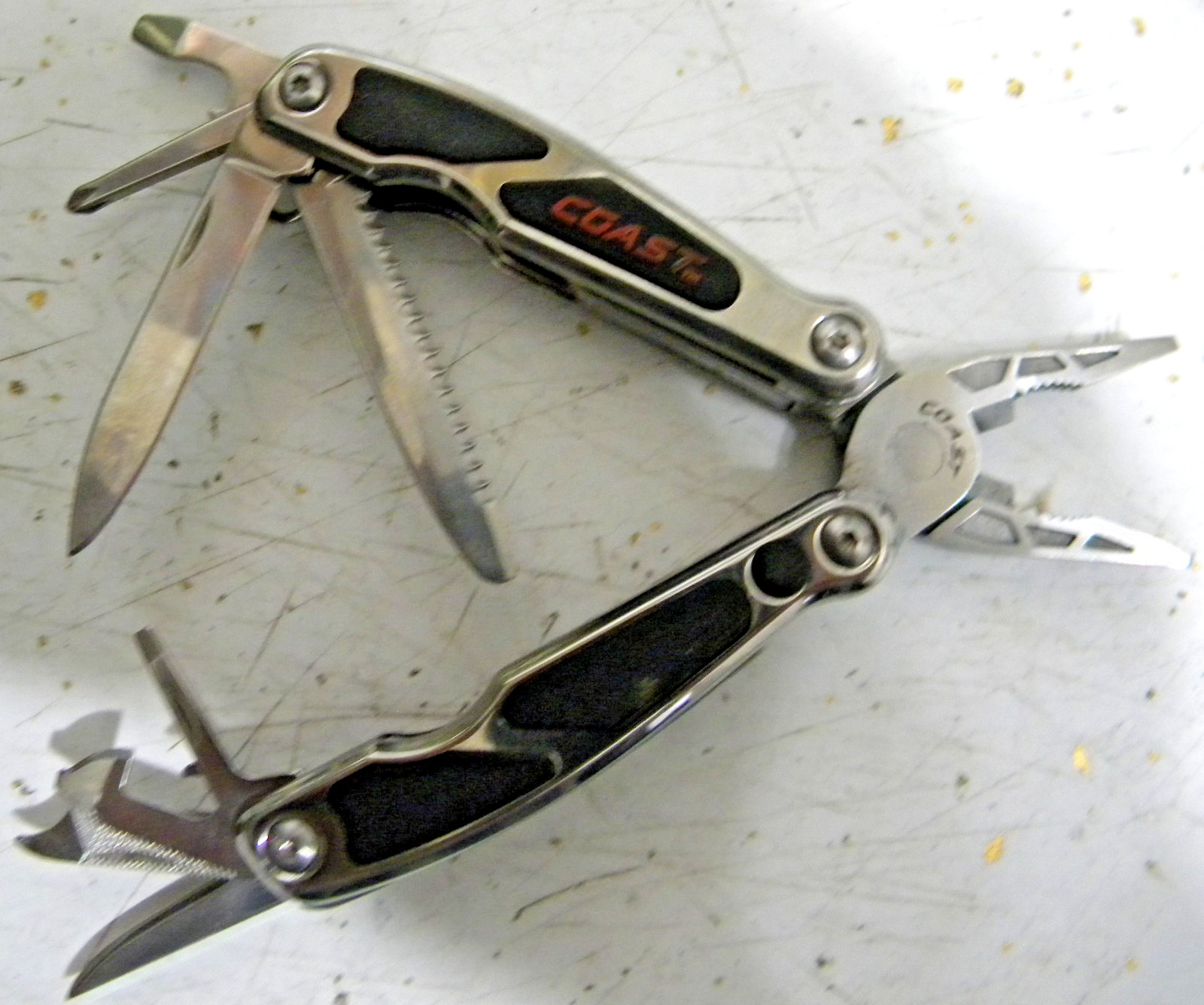 COAST Mini Multi Tool Silver and Black with built in LED and a Pocket knife
