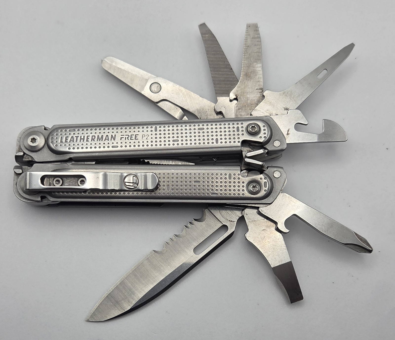 Retired Leatherman Free P2 Stainless Steel Multi-Tool Silver Great Condition