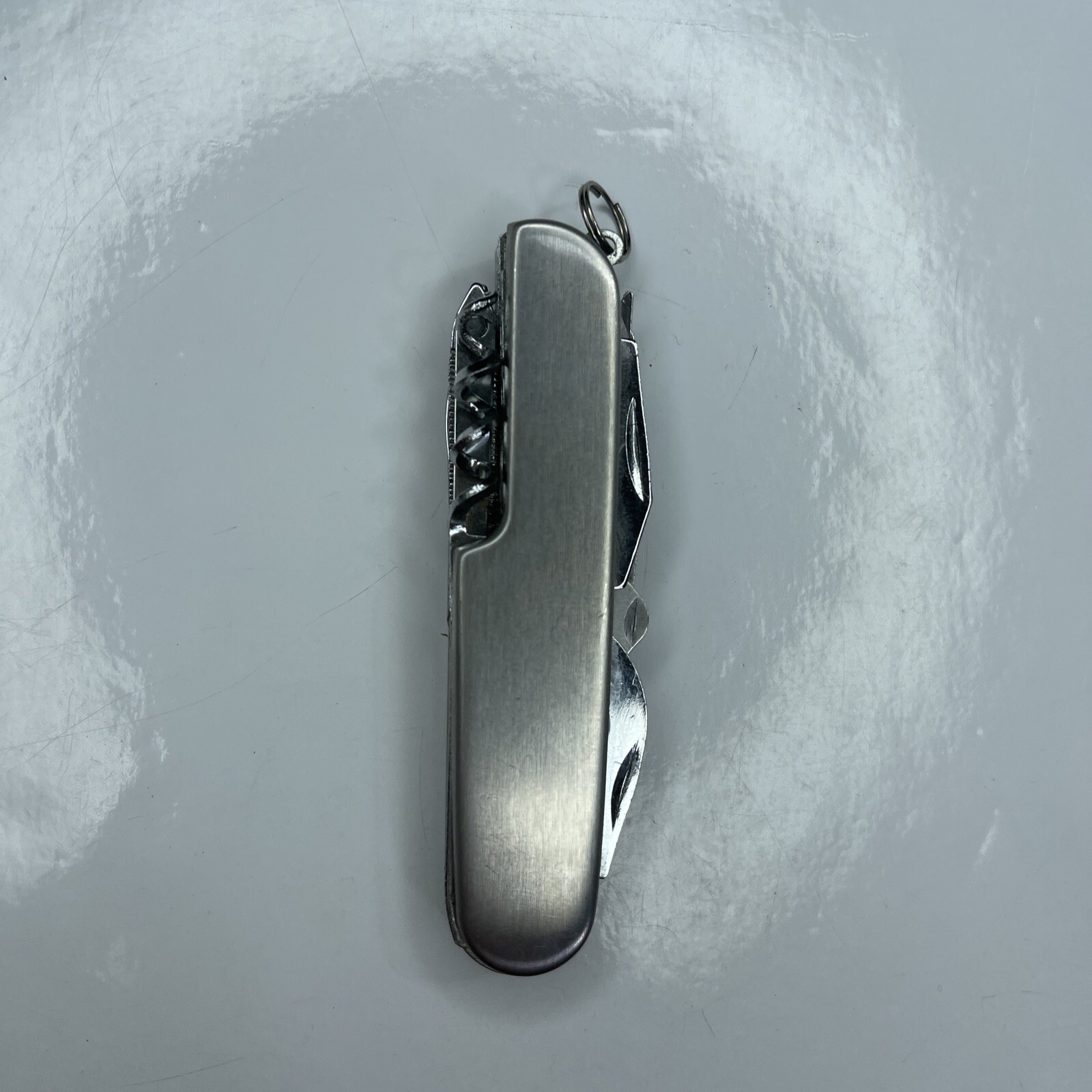A Silver Tone Folding Utility Pocket Army Knife Stainless Scissors Cork Opener
