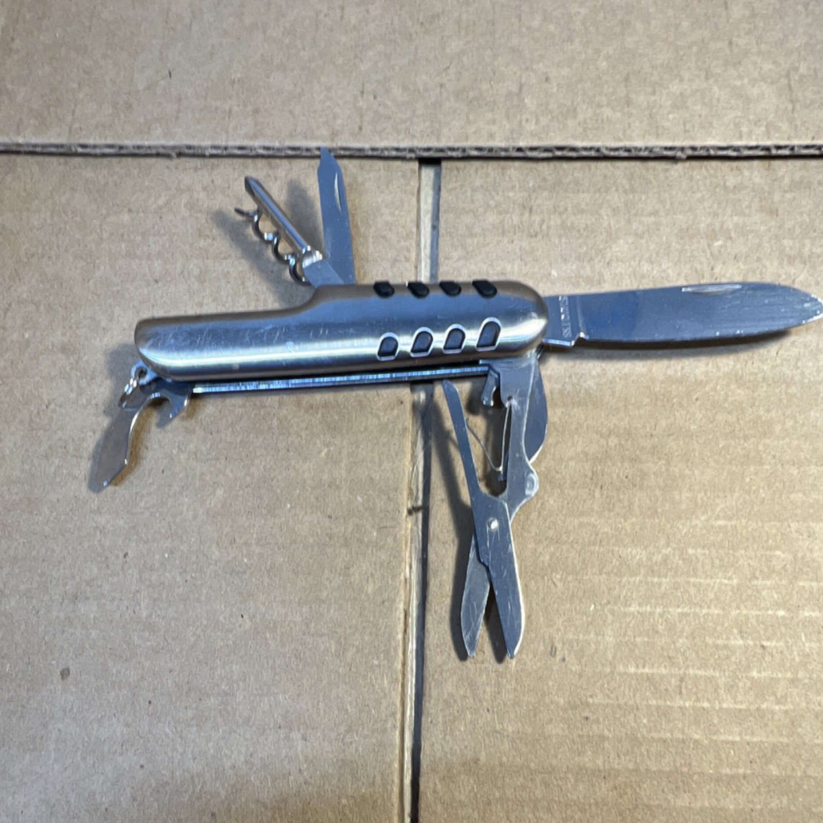 Silver Stainless Steel Multi-Tool with Knife, Scissors, Corkscrew, Bottle Opener