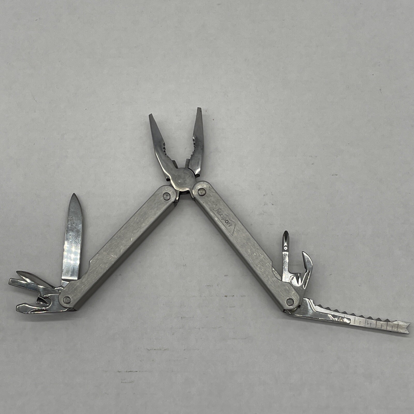 Texsport Multi Functional Folding Tool With Brown Holder