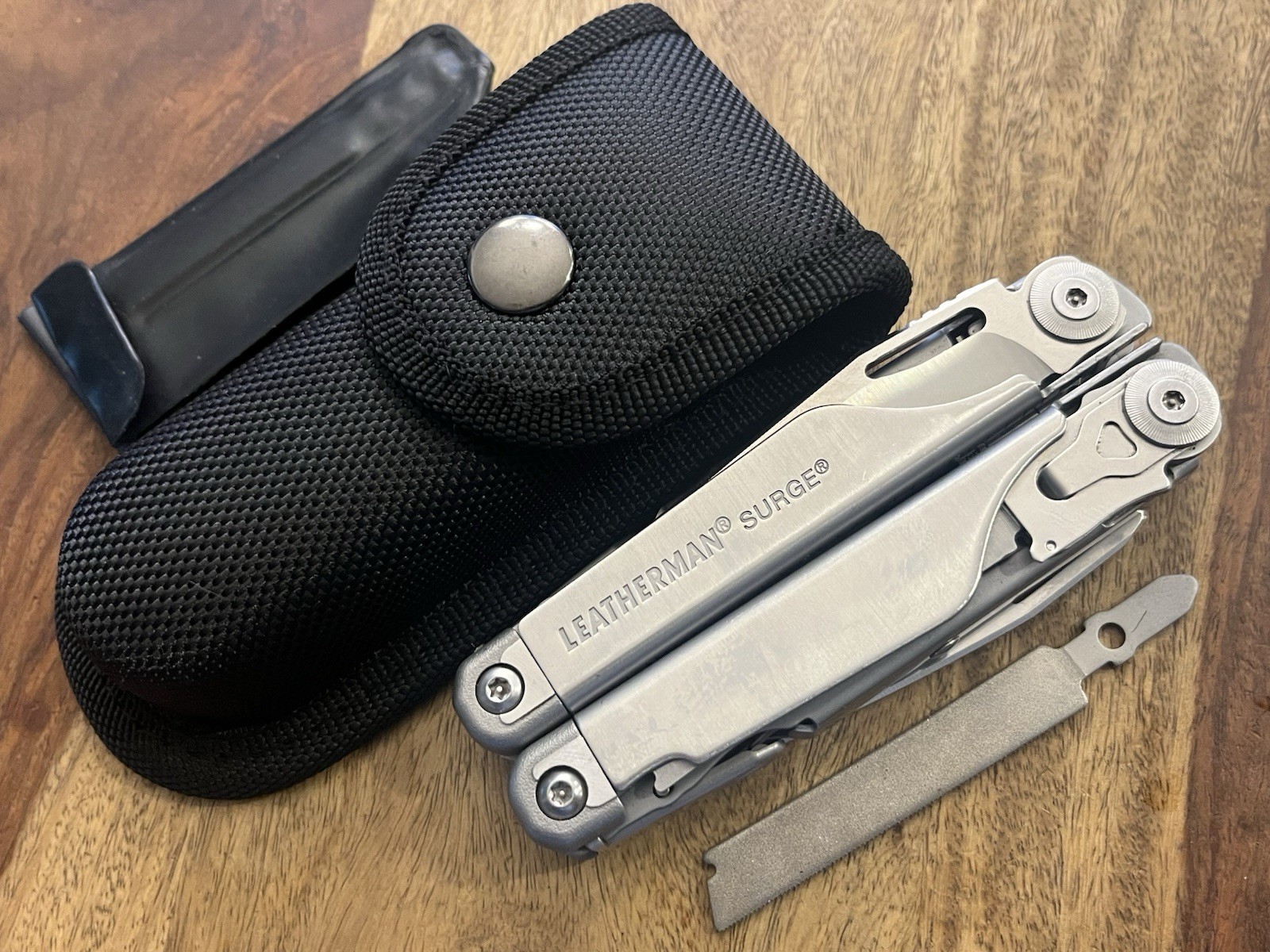 Leatherman Surge Multi-Tool Black Oxide Excellent Cond w/Sheath & Extra File