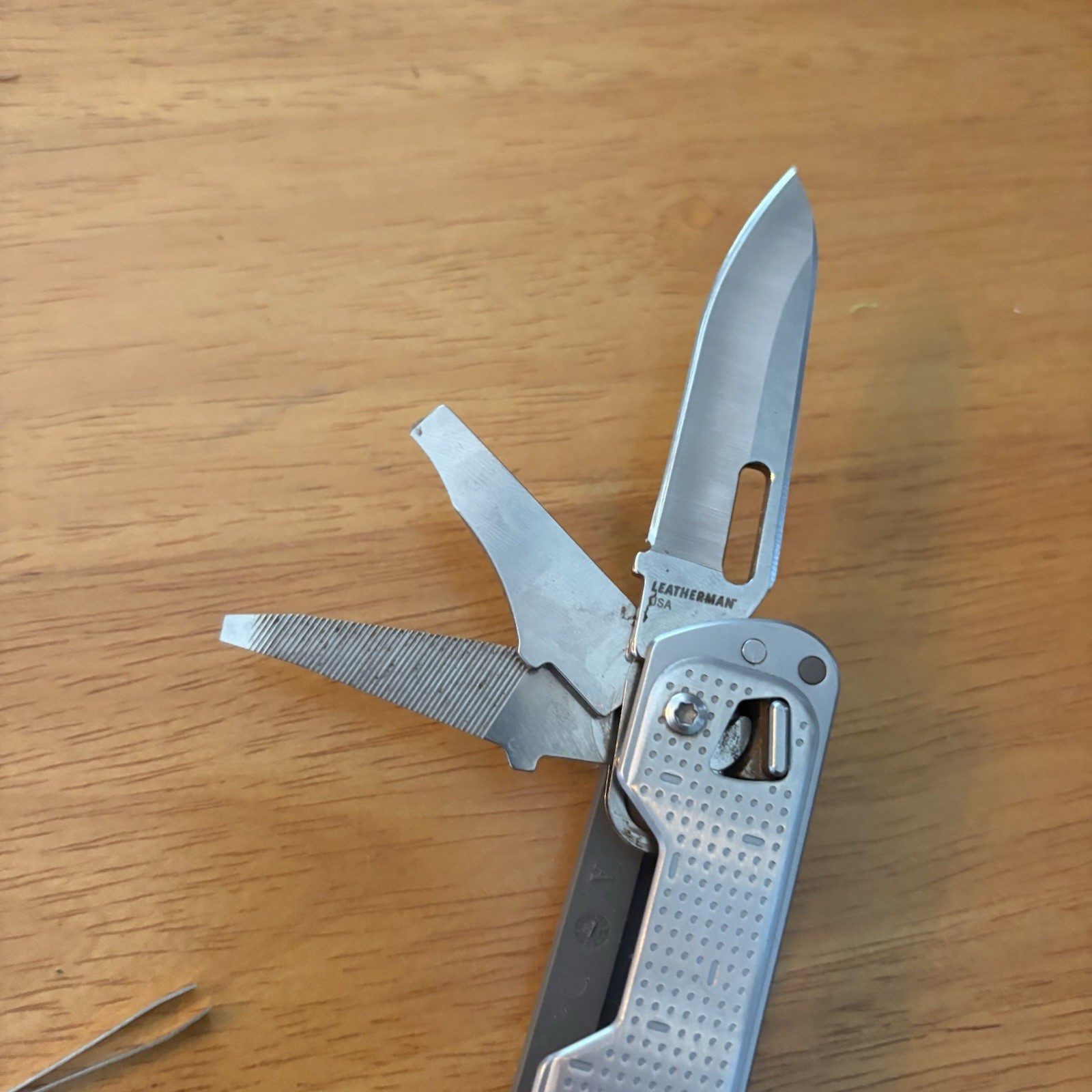 Leatherman FREE T4 Pocket Knife Multi-tool! Stainless! RETIRED!