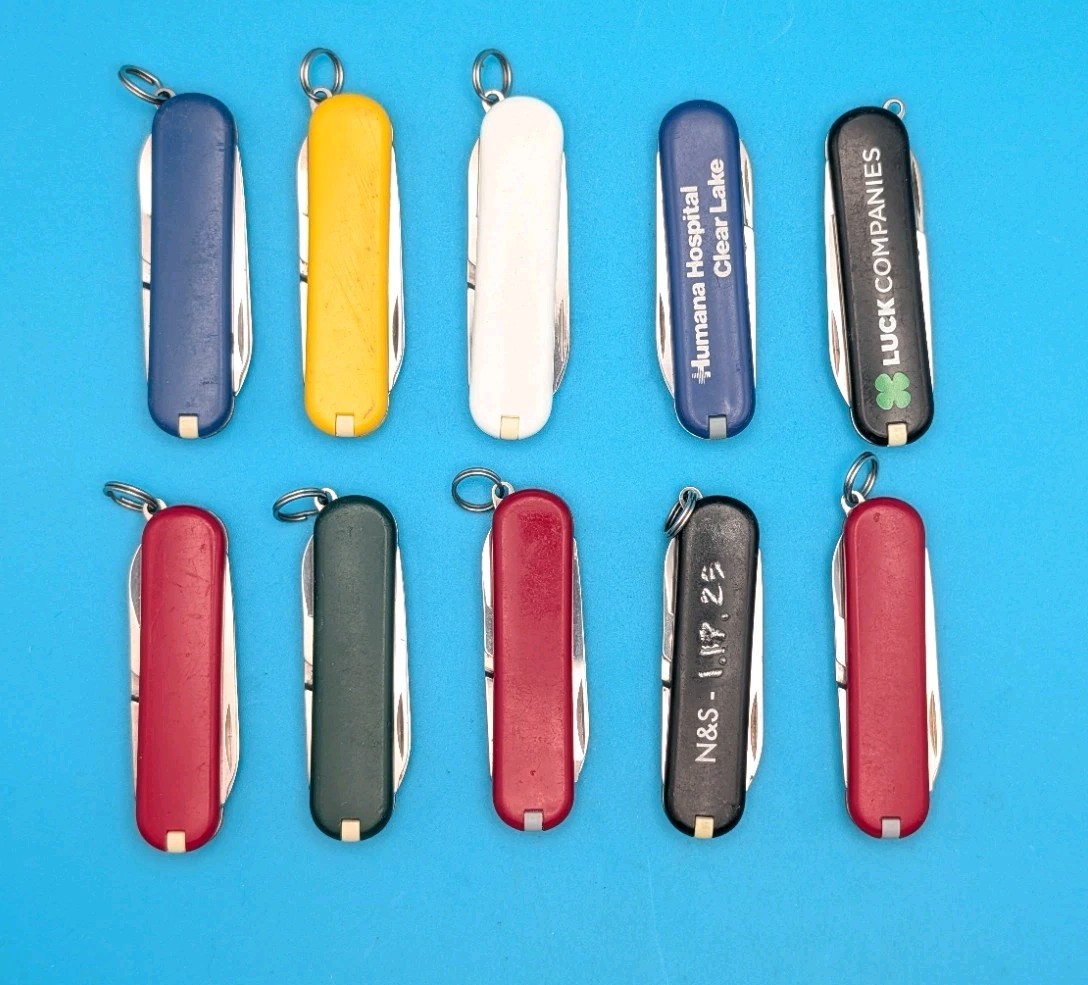 Lot of 10 Victorinox Classic Swiss Army Knife Multi Tools!