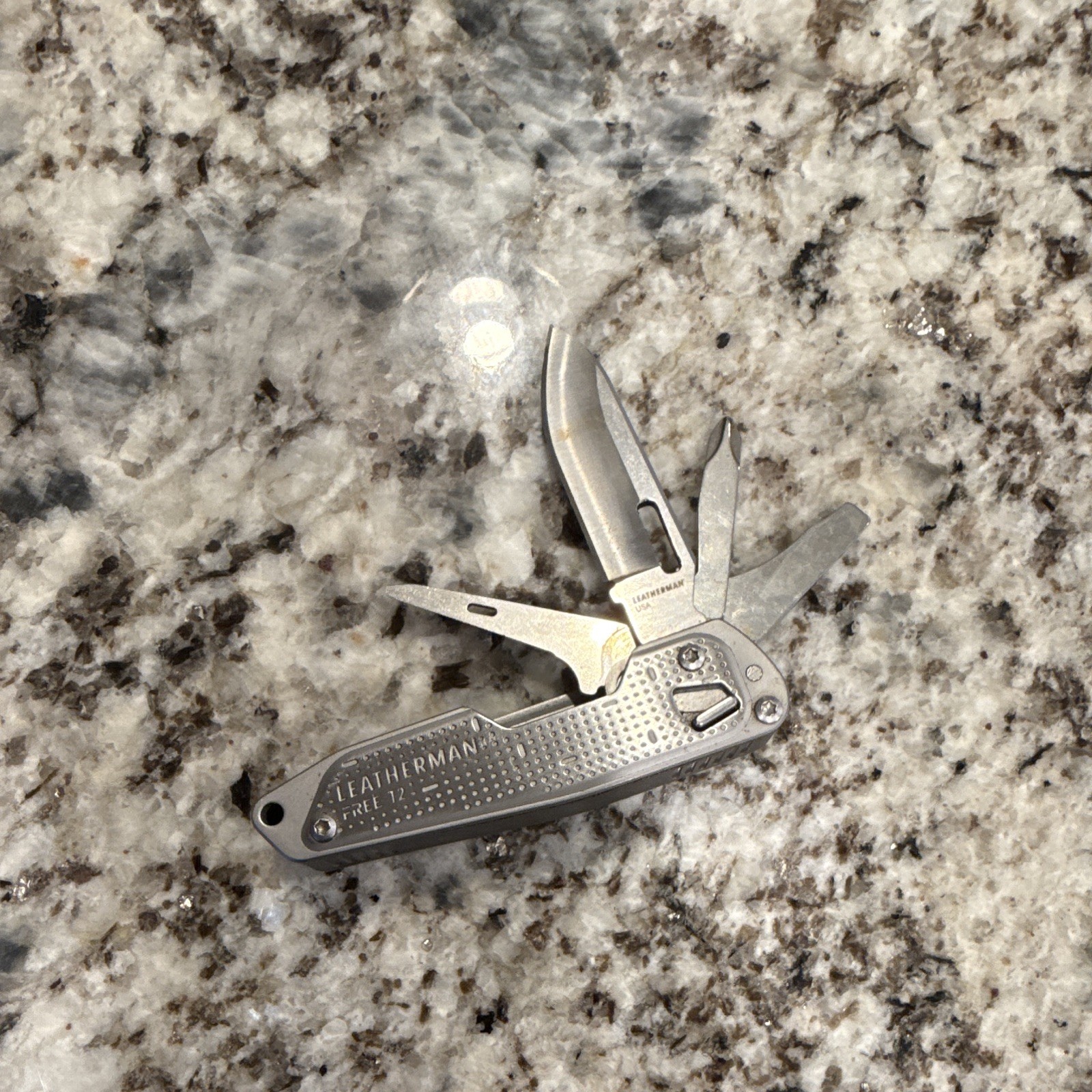 Leatherman FREE T2 Silver Multi-Tool 5 Tools, 2.2in Straight Blade, Clip