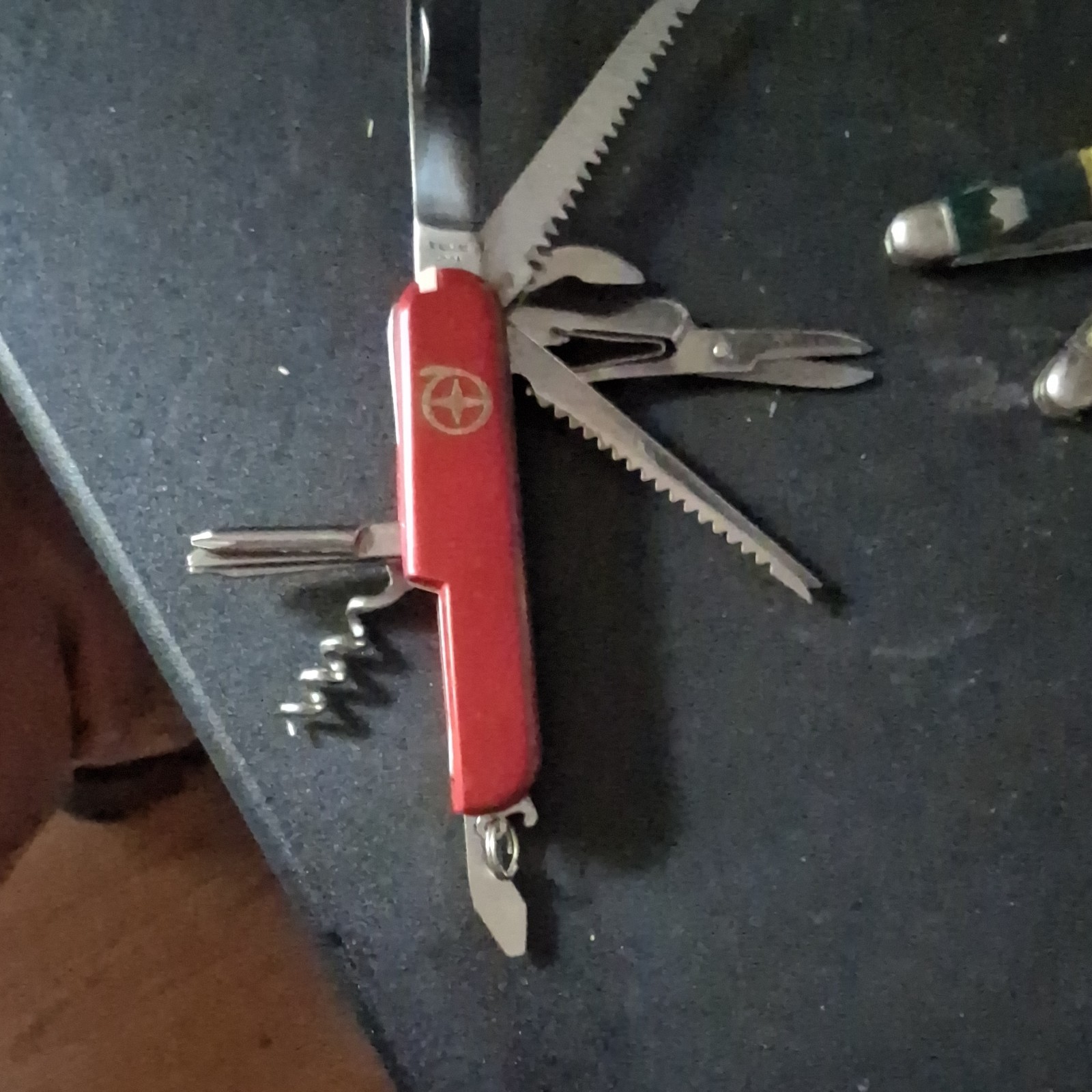 Red Stainless Steel Multi-Tool Knife, Saw, Scissors, Corkscrew, Opener