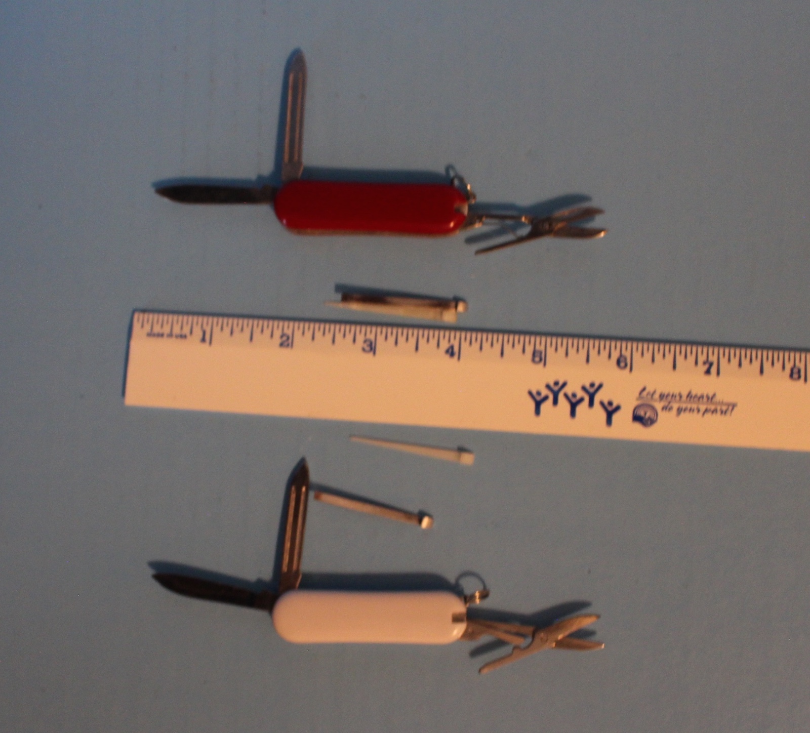 2 MULTI PURPOSE KNIFE LOT CAMPING HUNTING MULTI TOOL ONE RED ONE WHITE LOGO