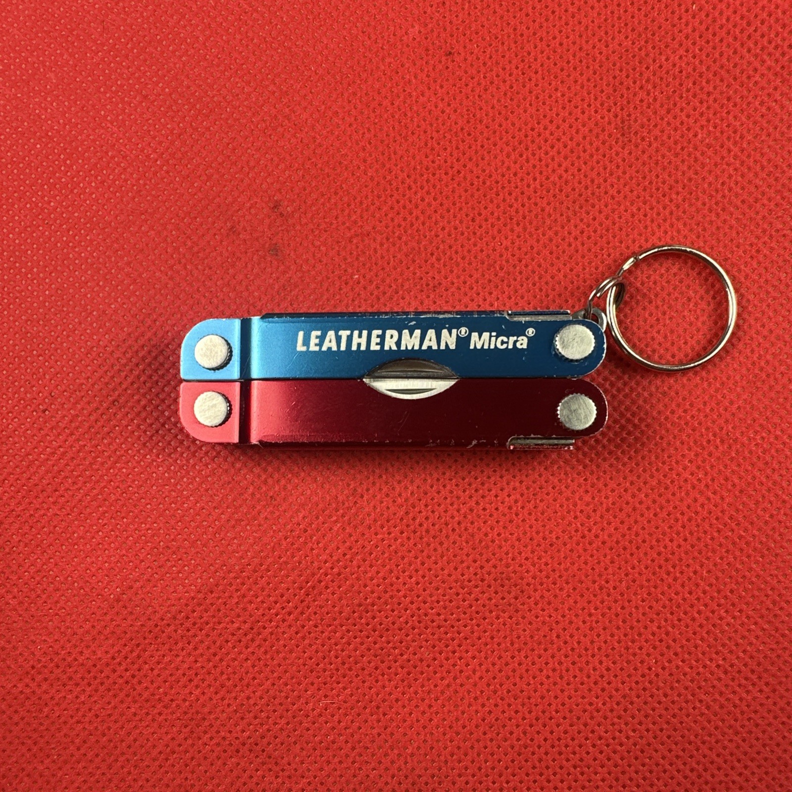 Red Blue Leatherman Micra Multi-Tool, scissor, knife, tweezer, screwdriver, EDC
