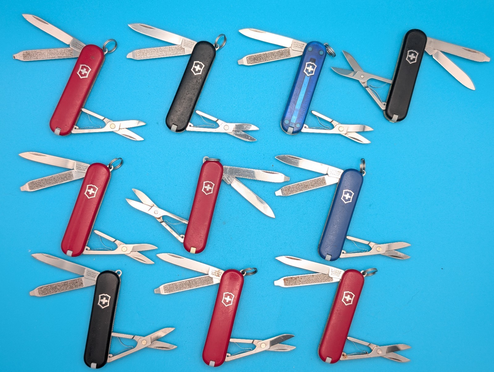 Lot of 10 Victorinox Classic Swiss Army Knife Multi Tools!