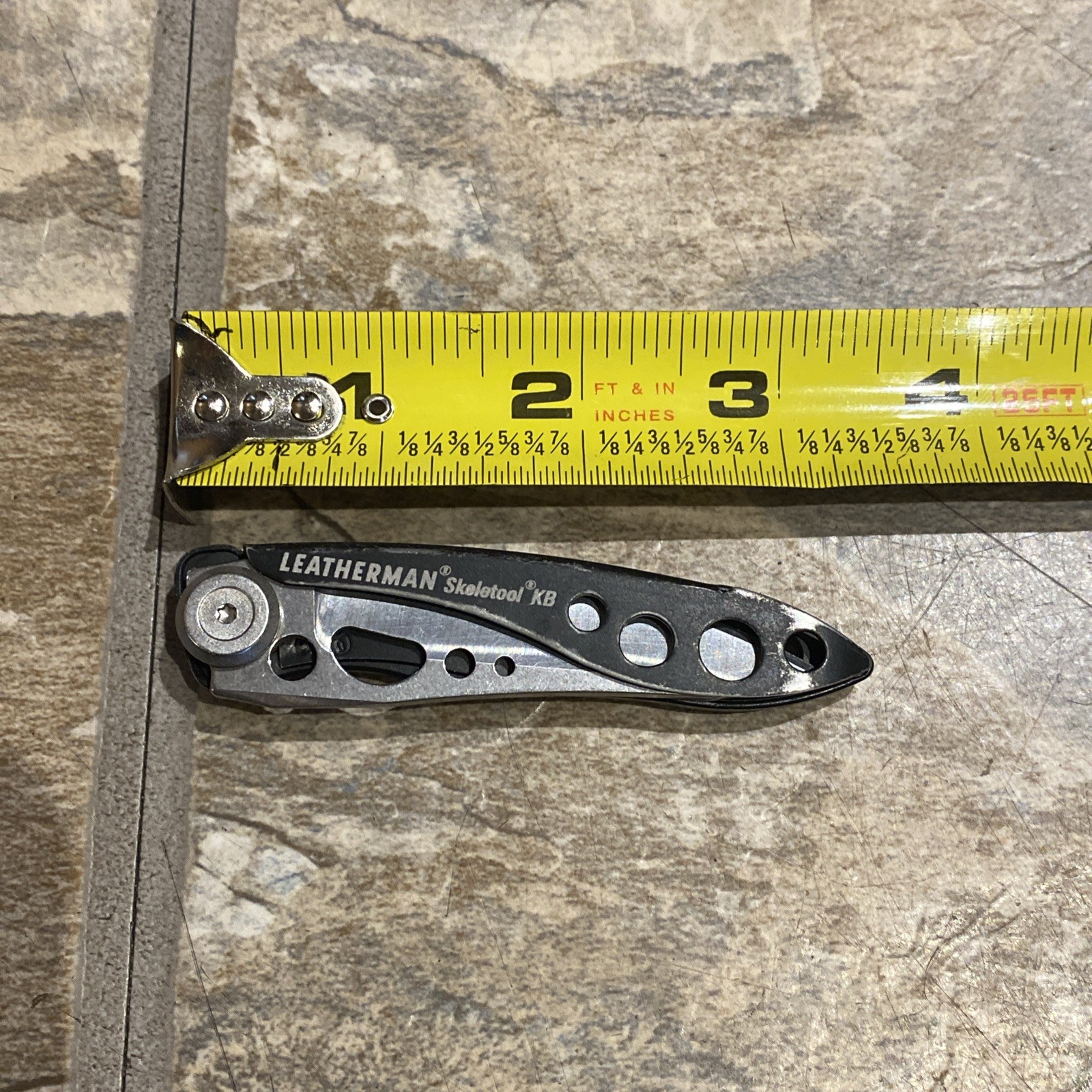 Nice! Leatherman Skeletool KB Folding Knife USA Black Handles With Bottle Opener