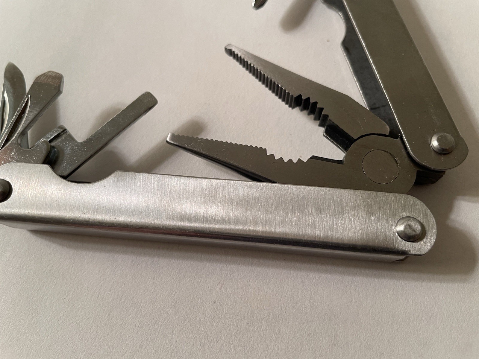 Stainless Steel Multitool 9-function Pliers Knife Screwdriver File Bottle Opener