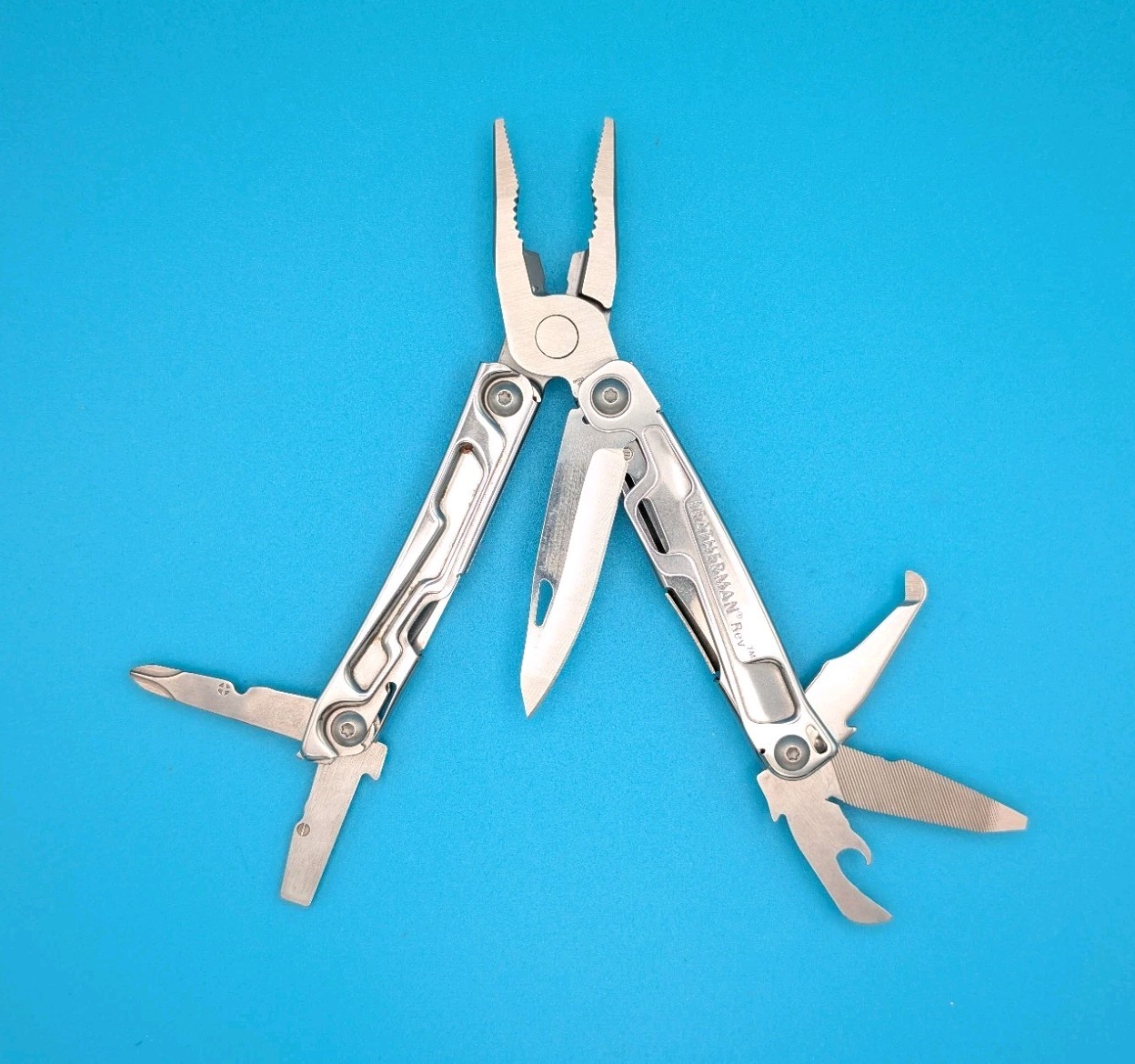 Leatherman Rev 3.8″ Multi-Tool, Stainless! With Sheath!