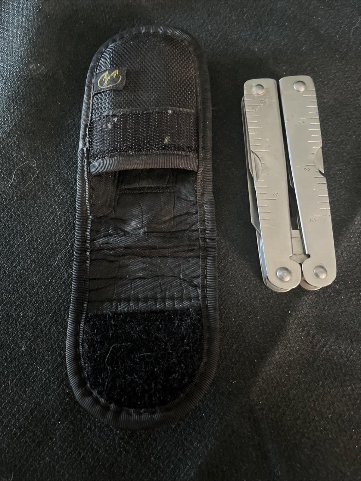 Winchester Stainless Steel Multi-Tool Pliers Serrated Knife Sheath 4 1/2”