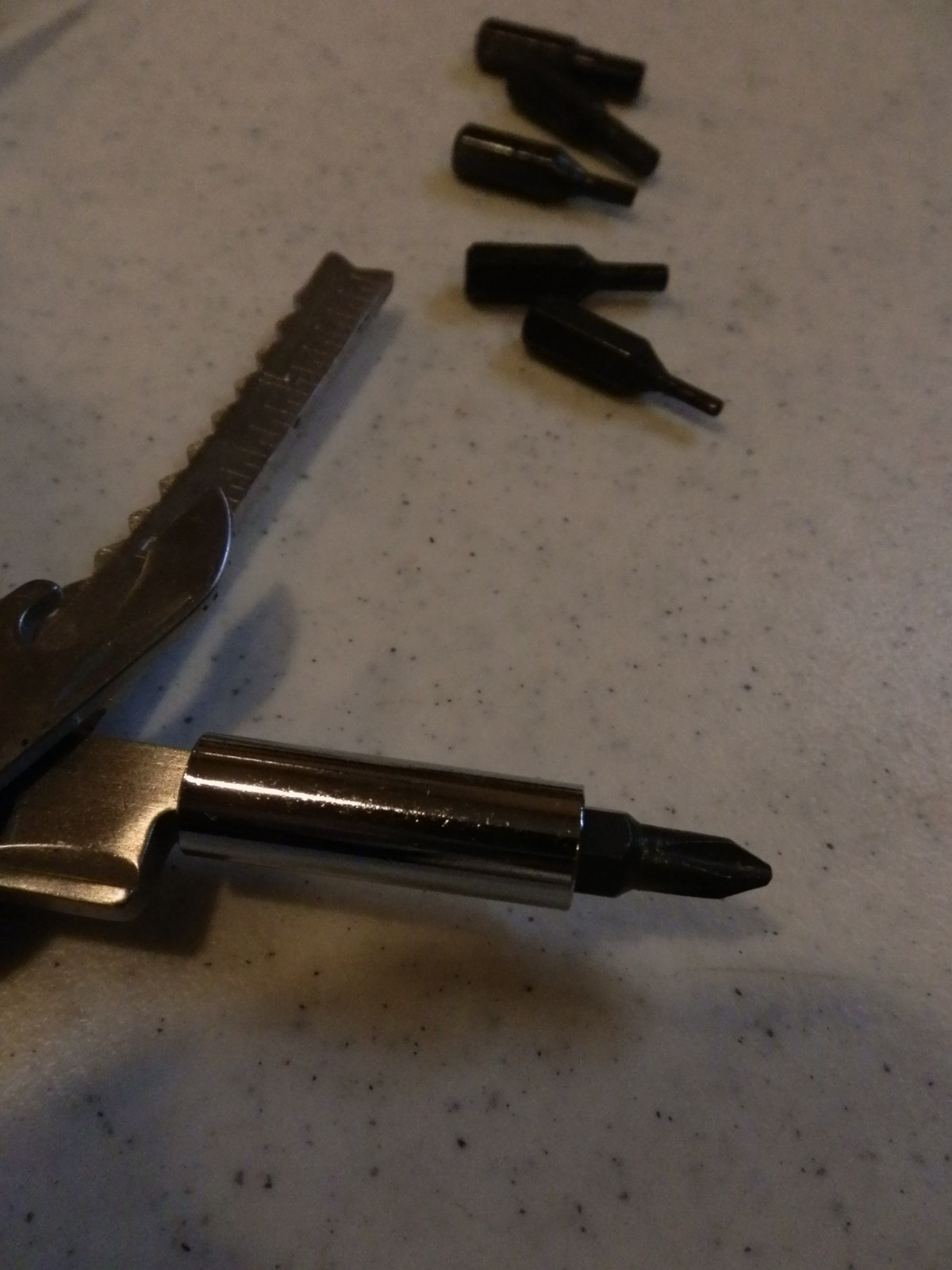 Multitool. Unbranded. Nylon sheath. 8 auxilliary bits – see photos. EUC