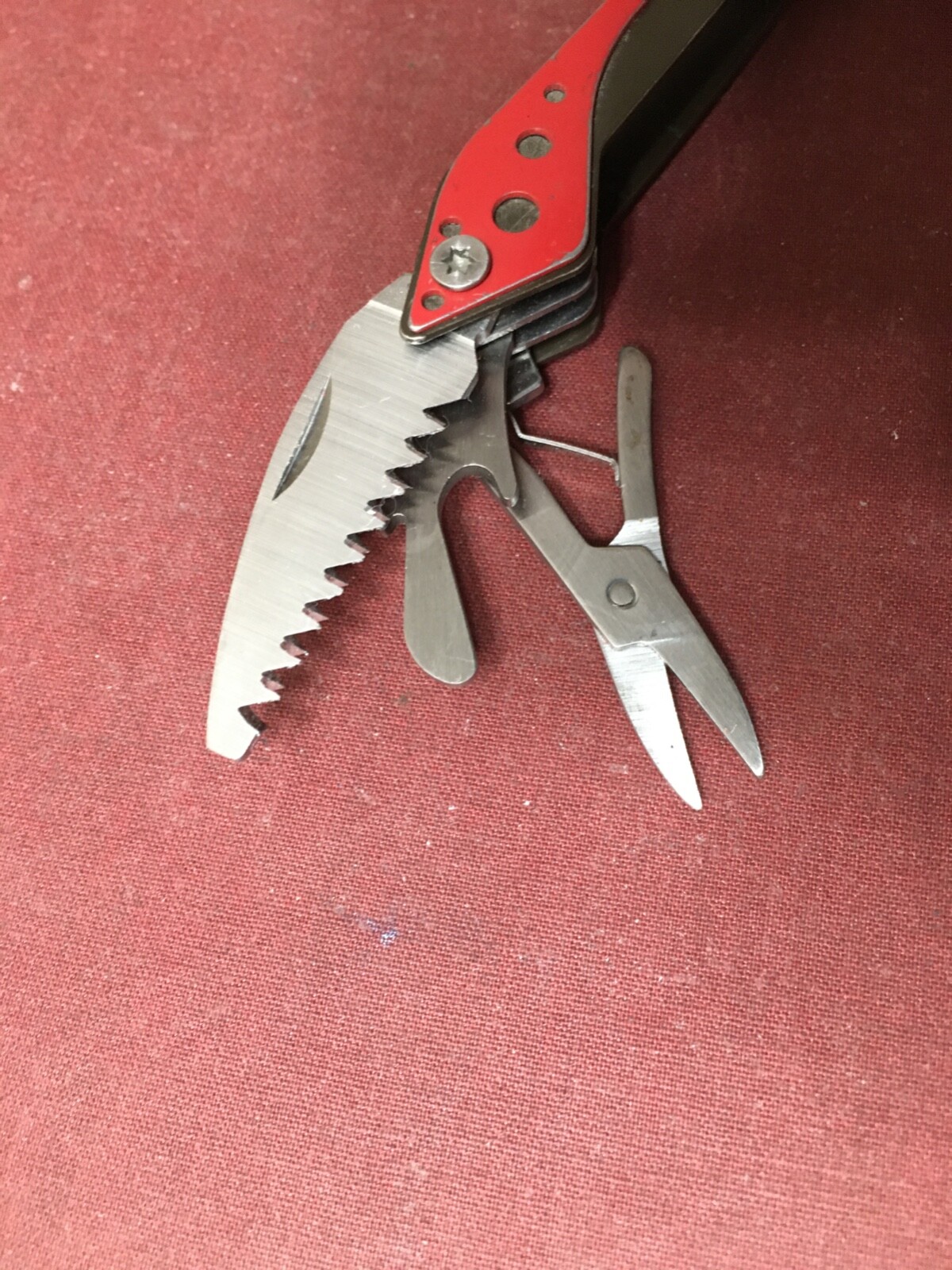 Cabela’s 4-1/2″ Multi-Tool in Red and Black with 7 Tools In One