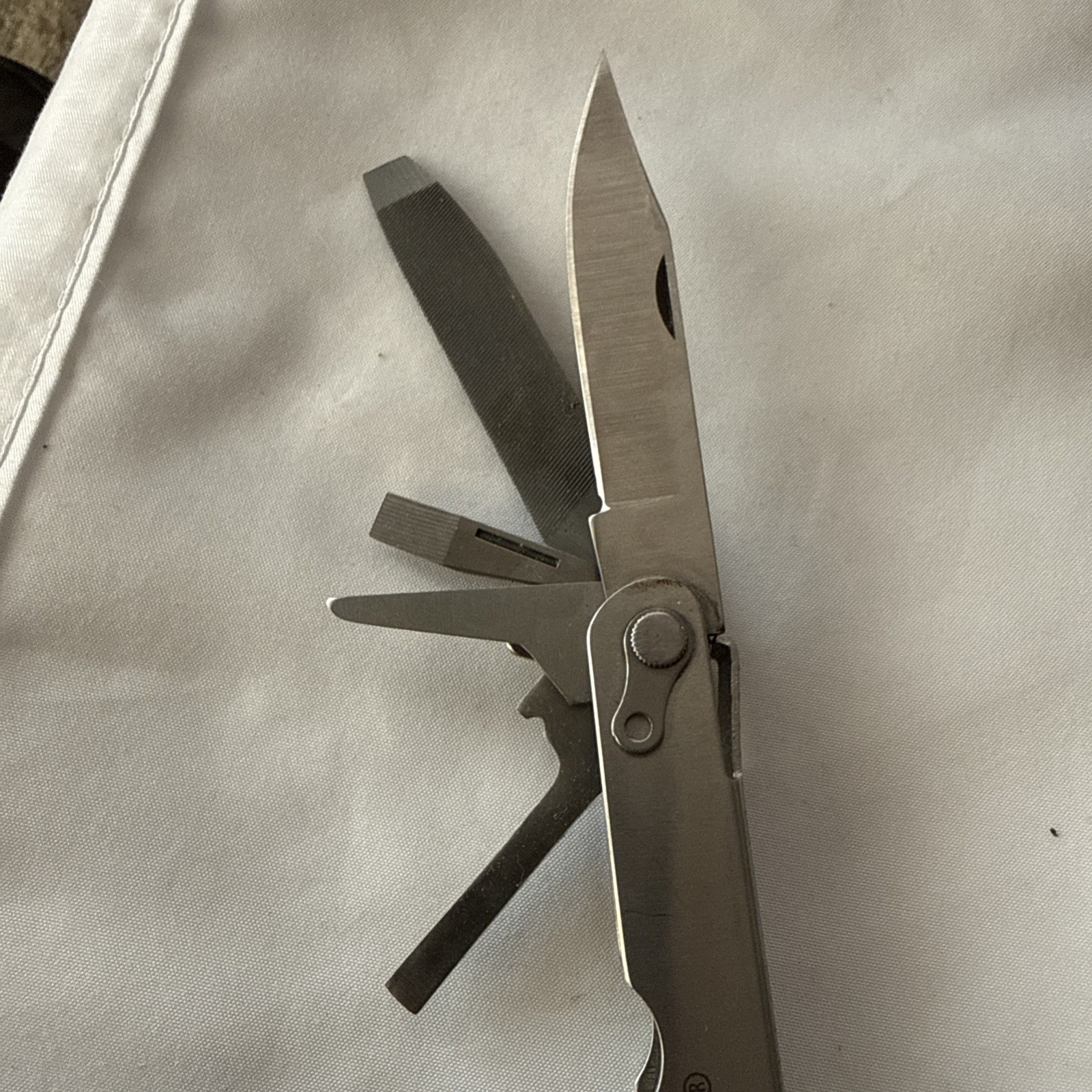 Tool Shop, multitool 13 tools plus!!! Nice tool!!! Not branded Stainless Steel