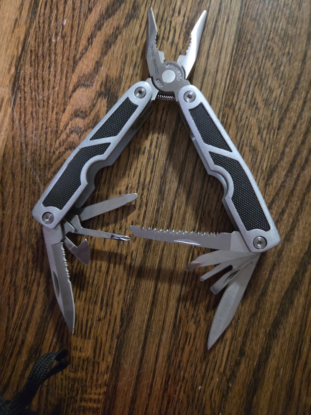 OZARK Trail large multi tool pliers(BLACK/SILVER)handle 2-knife blades saw—GREAT