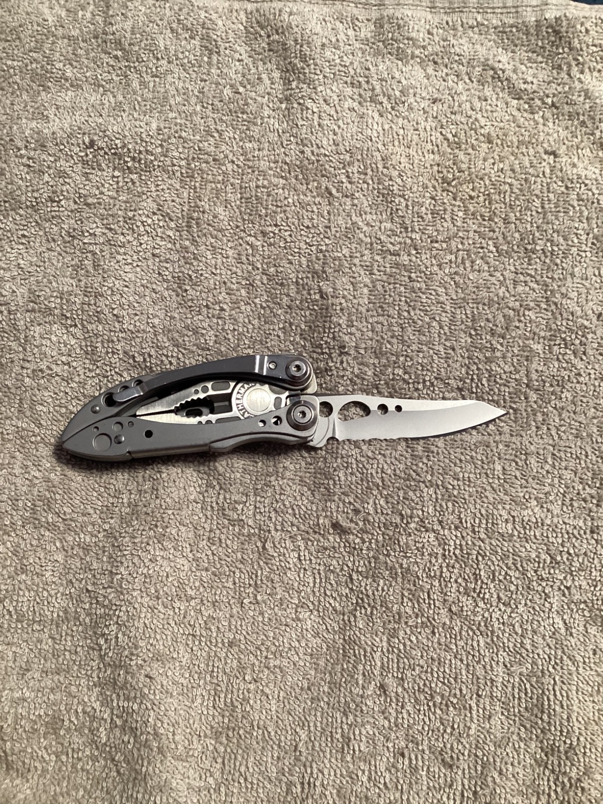 Leatherman FREESTYLE Multi Tool W/ Leather Pouch NEW