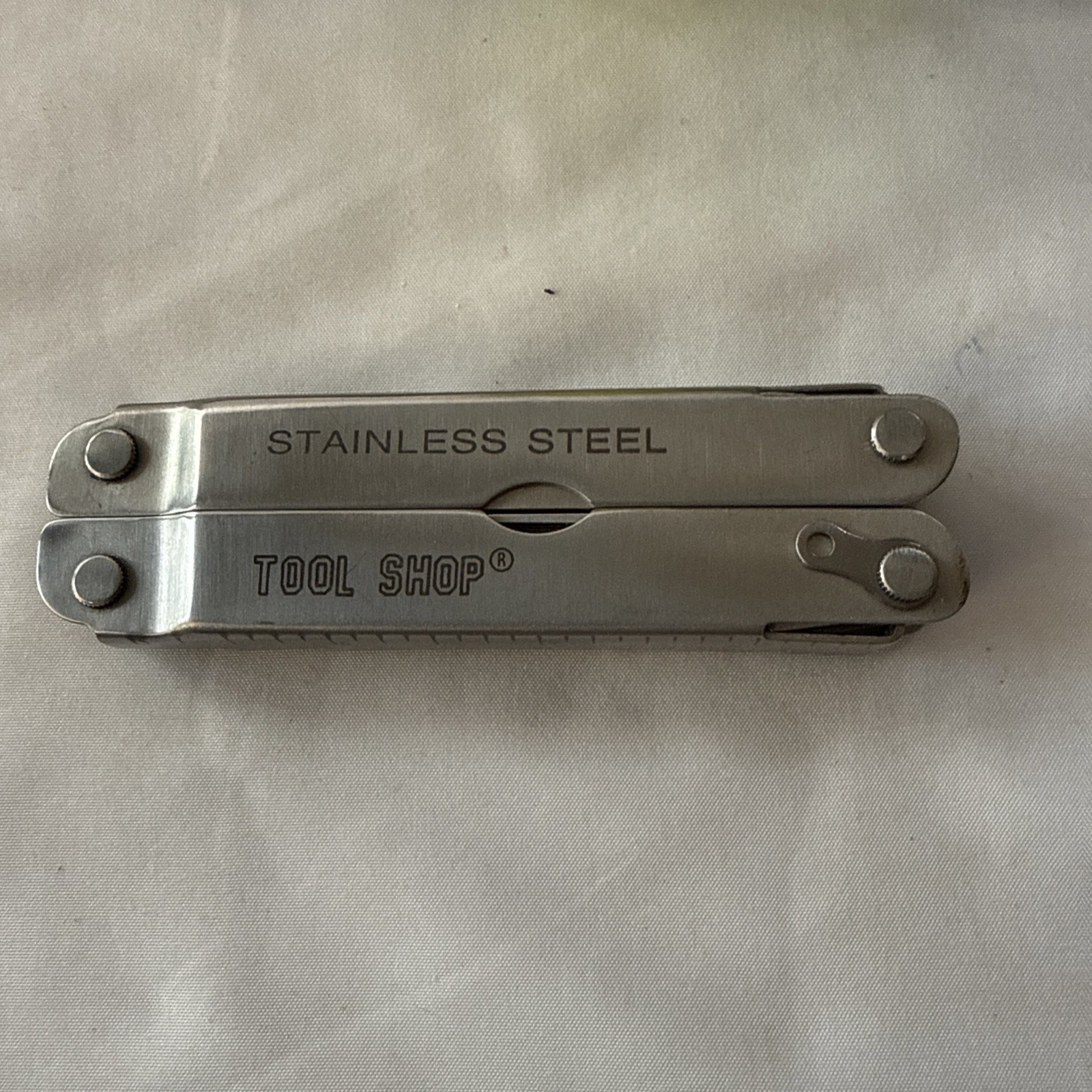 Tool Shop, multitool 13 tools plus!!! Nice tool!!! Not branded Stainless Steel