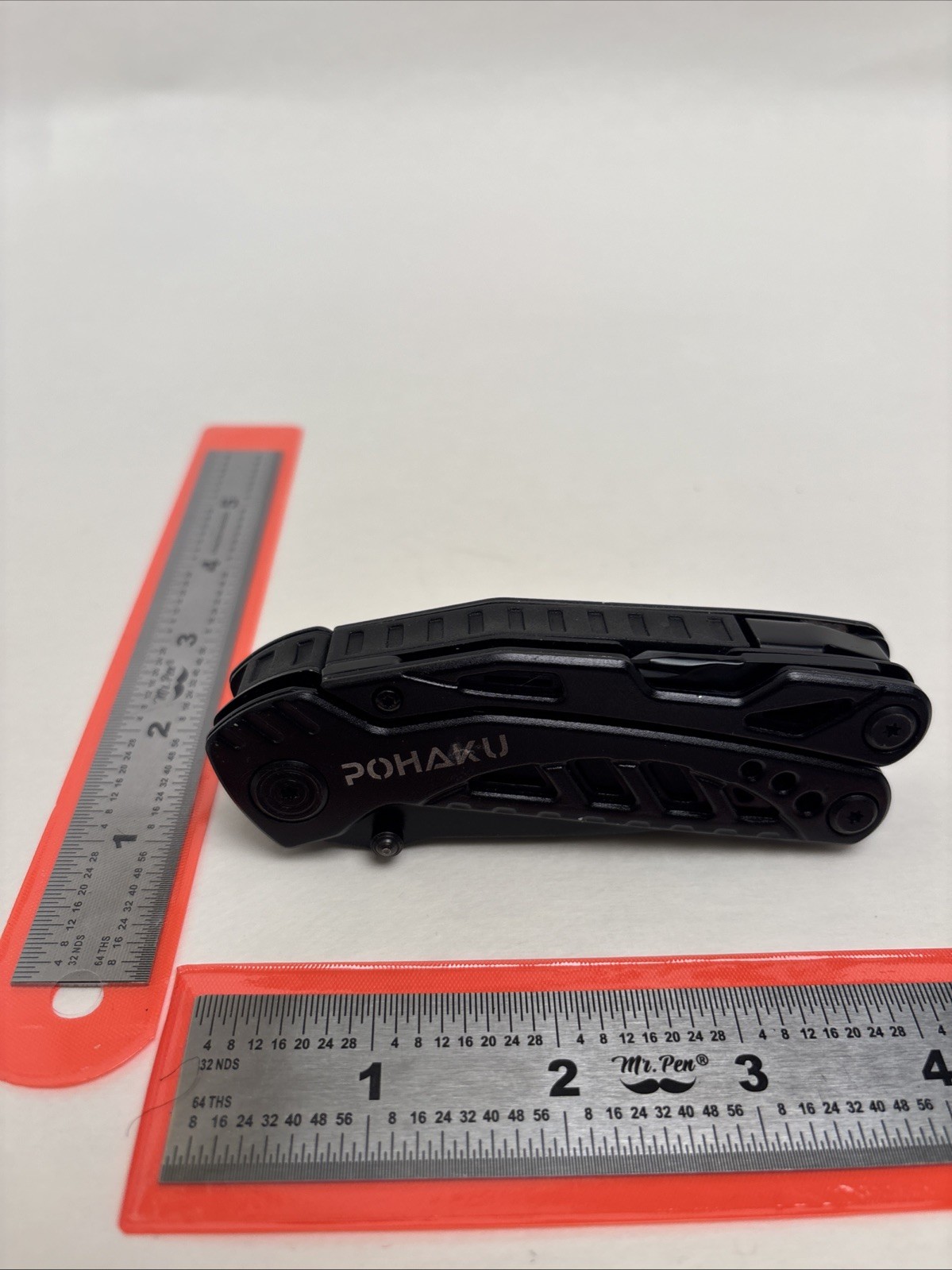 POHAKU BLACK MULTI-TOOL WITH PLIERS, KNIFE, SAW, FILE, SCREWDRIVERS