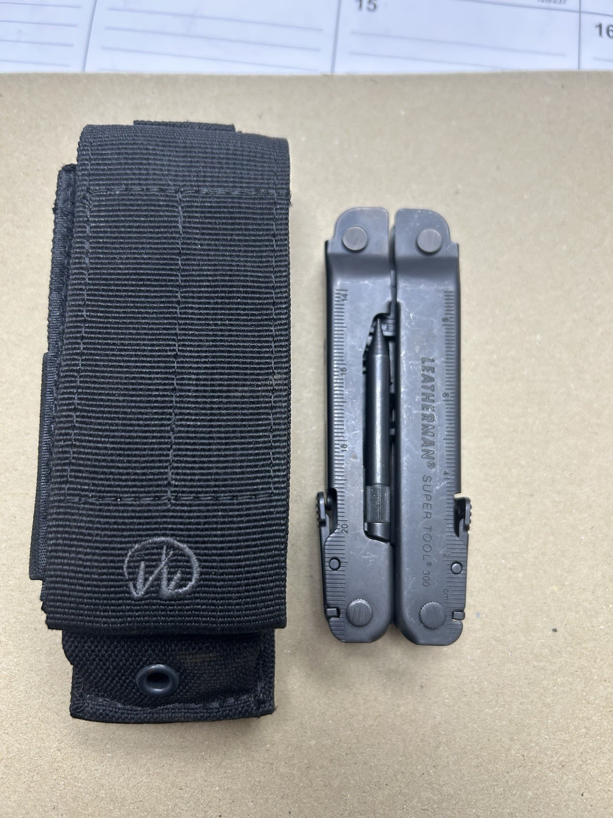 Leatherman Super Tool 300 Multitool Black Oxide w/Leatherman Molle Sheath