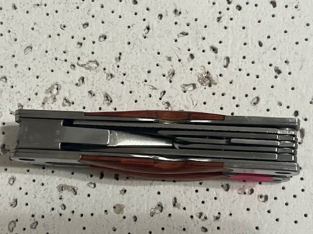 NRA Multi-Tool 4.5” Pliers ,Knives , Can Opener , Ruler and Saw Wood Handle—