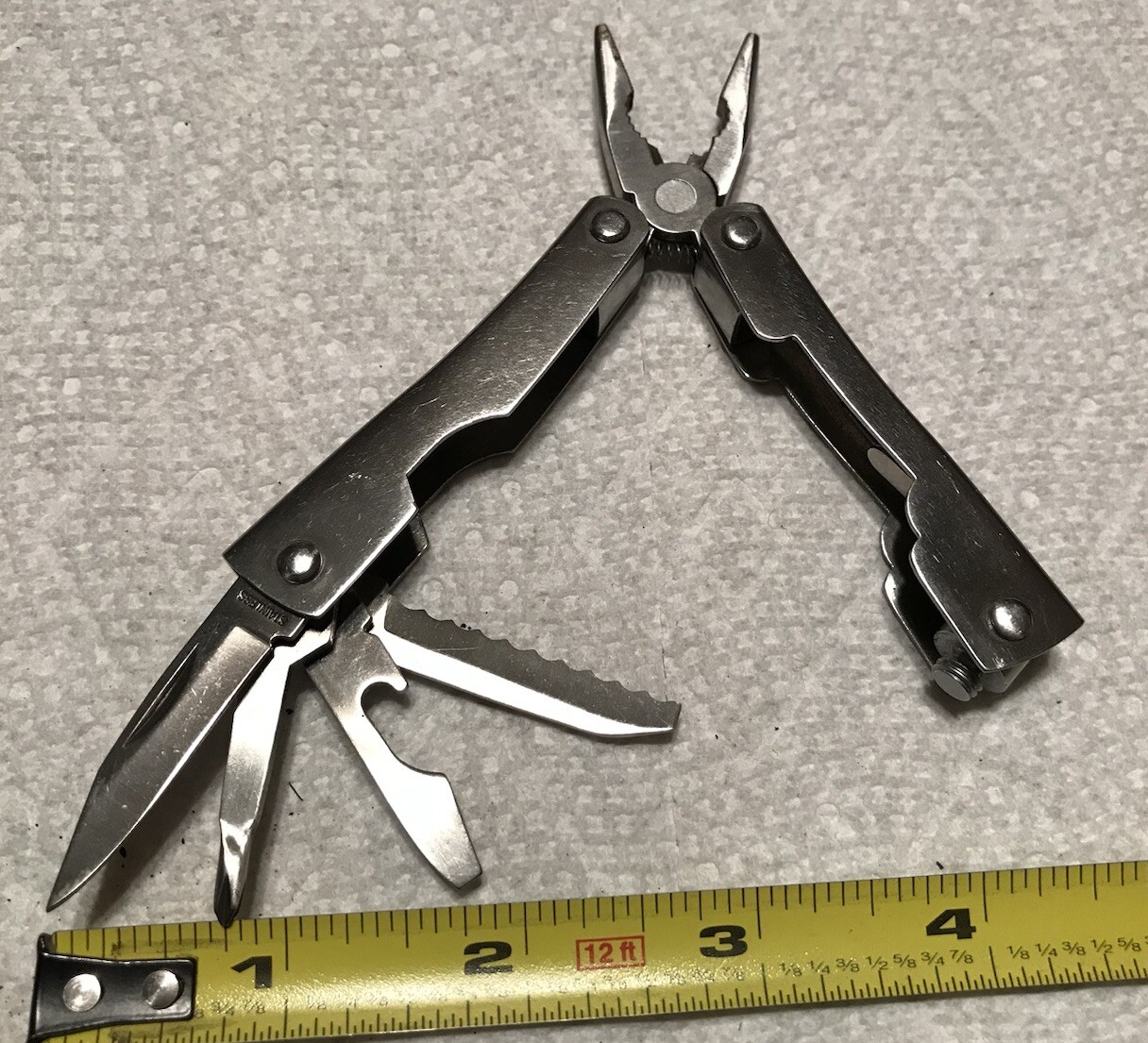 Unbranded Stainless Multi-purpose Tool Kit. 5-tool, Spring Loaded