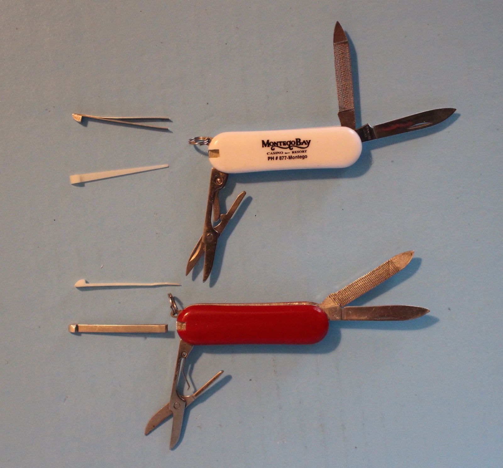 2 MULTI PURPOSE KNIFE LOT CAMPING HUNTING MULTI TOOL ONE RED ONE WHITE LOGO