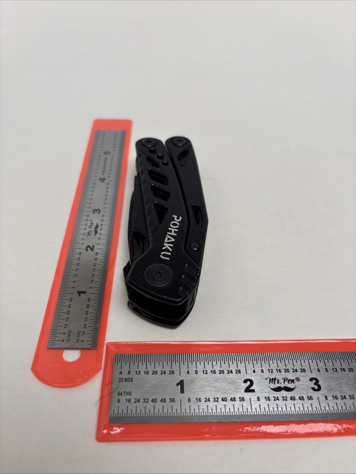 POHAKU BLACK MULTI-TOOL WITH PLIERS, KNIFE, SAW, FILE, SCREWDRIVERS