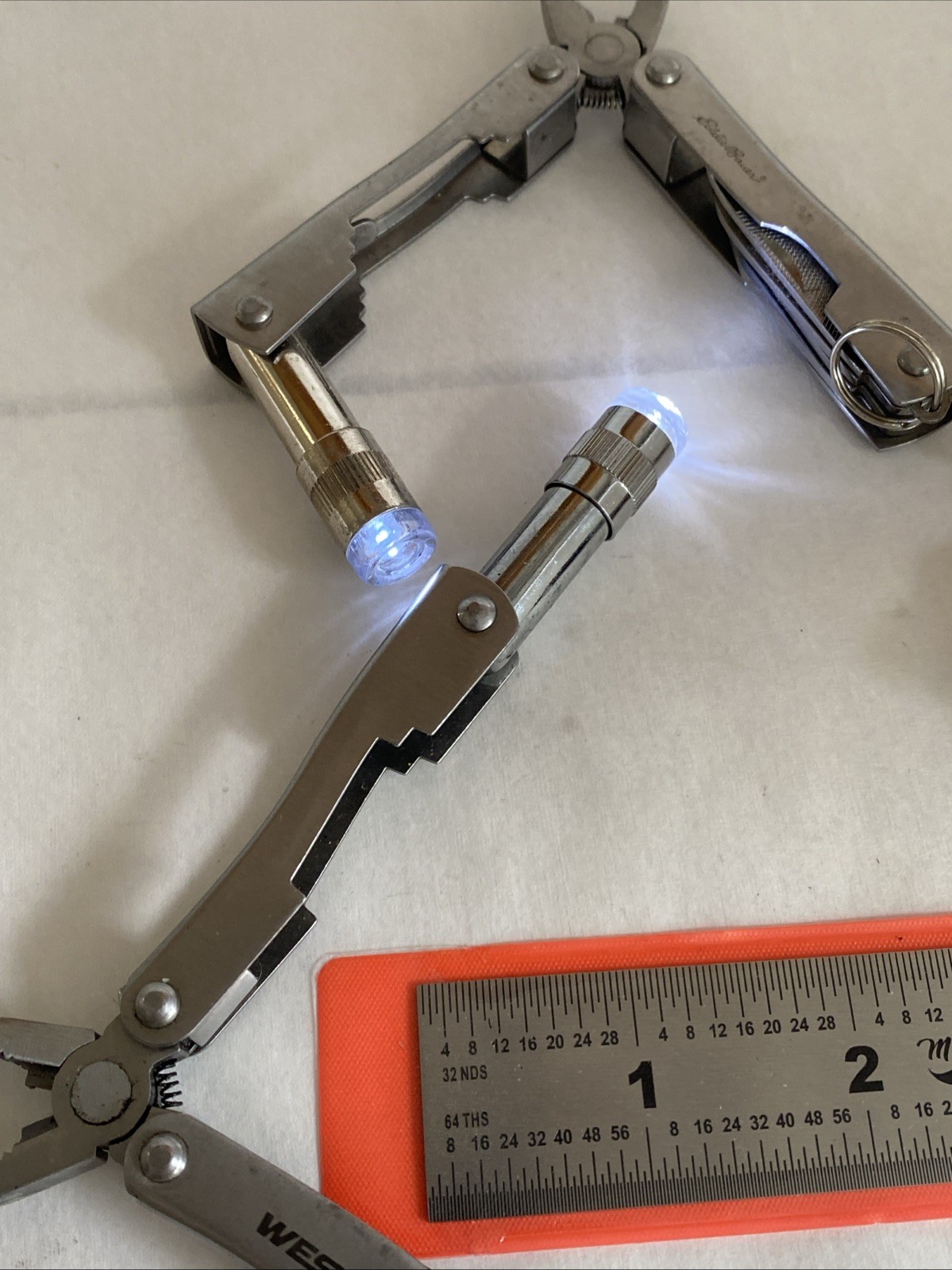 Lot of 4 Mini Multitools Columbia Eddie Bauer Husky. Flashlights Work. Hike Camp