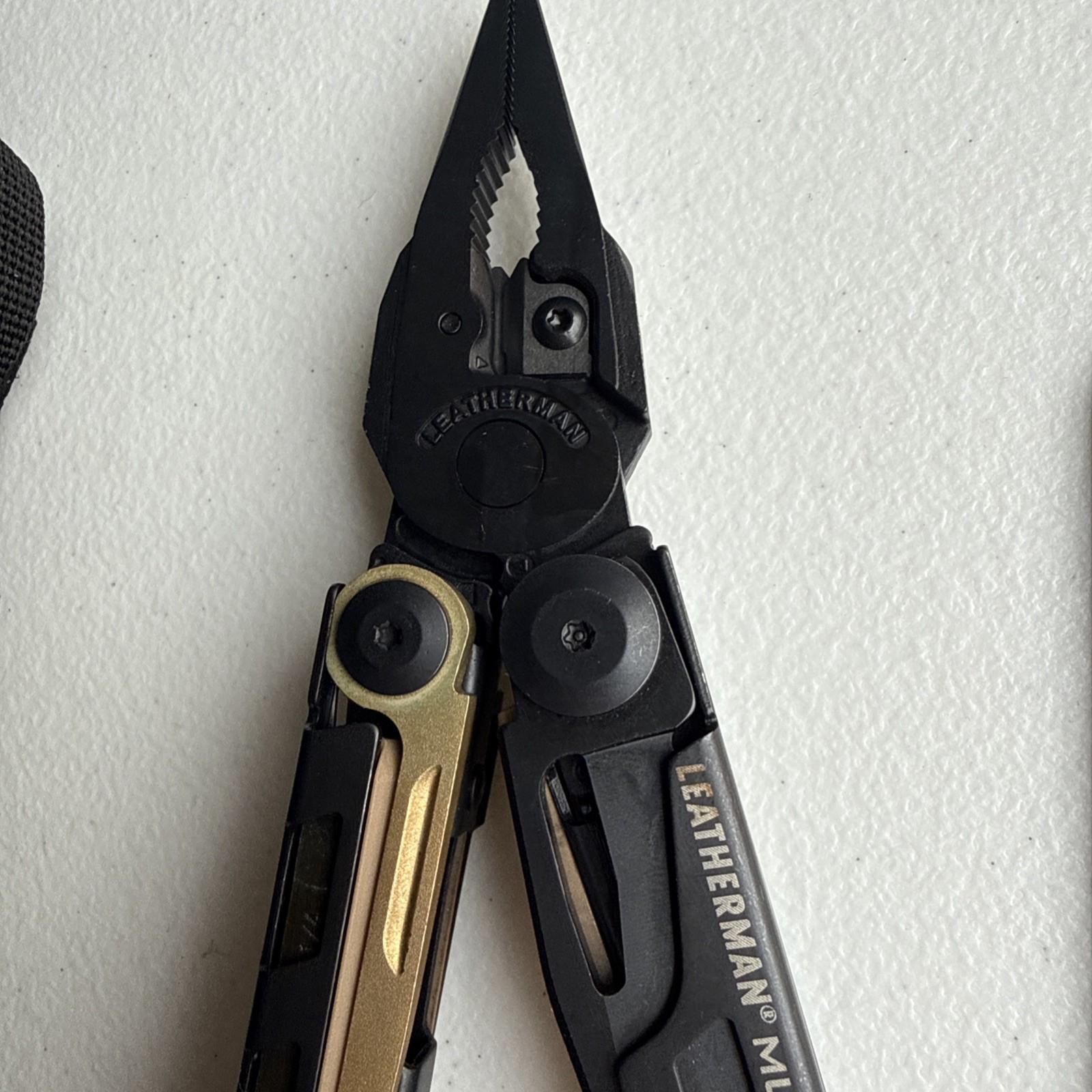 Leatherman MUT Tactical Multi Tool with Black Molle Sheath – Black (850222)