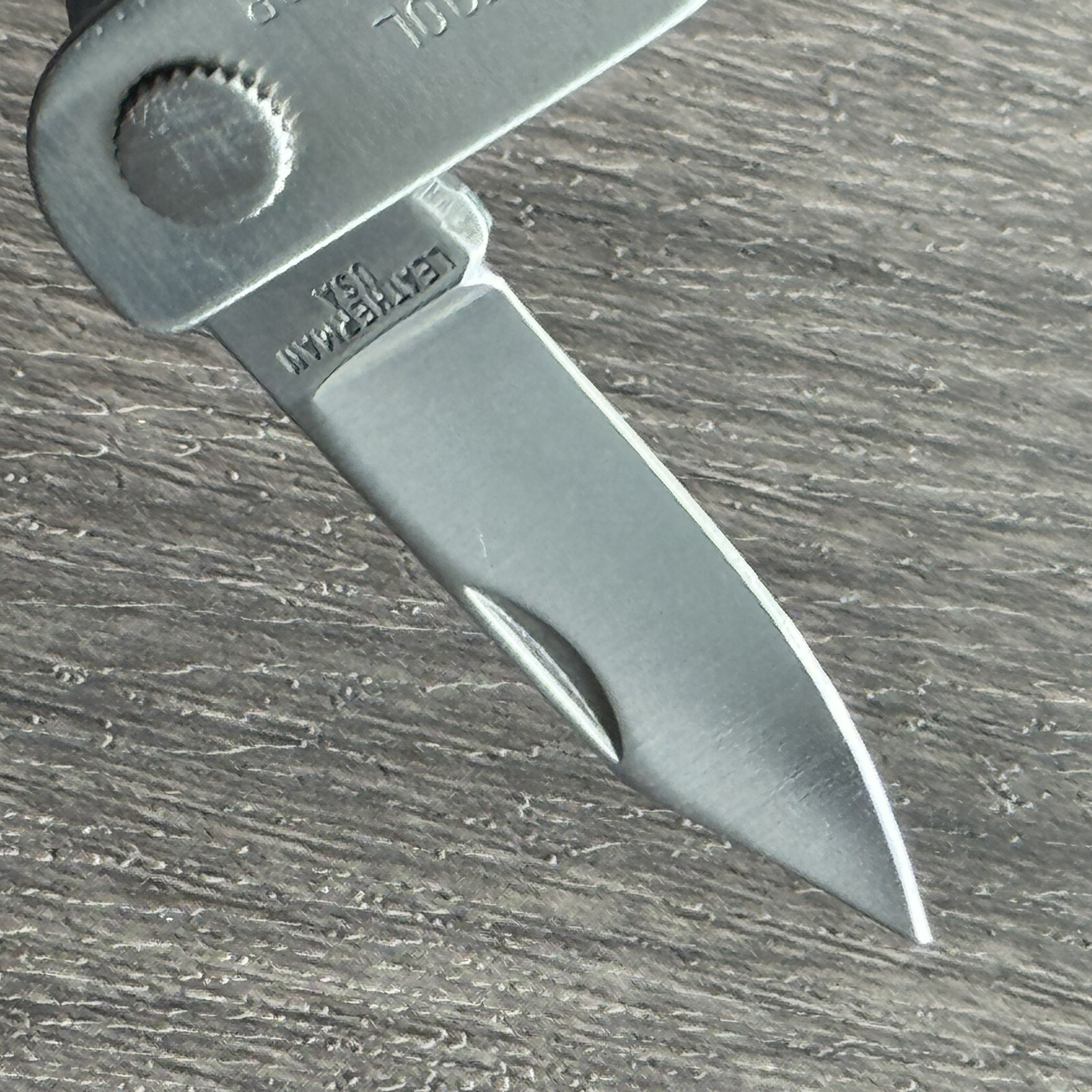 Leatherman MINI TOOL multitool. Variant w/US PAT 4744272 and a Blank side